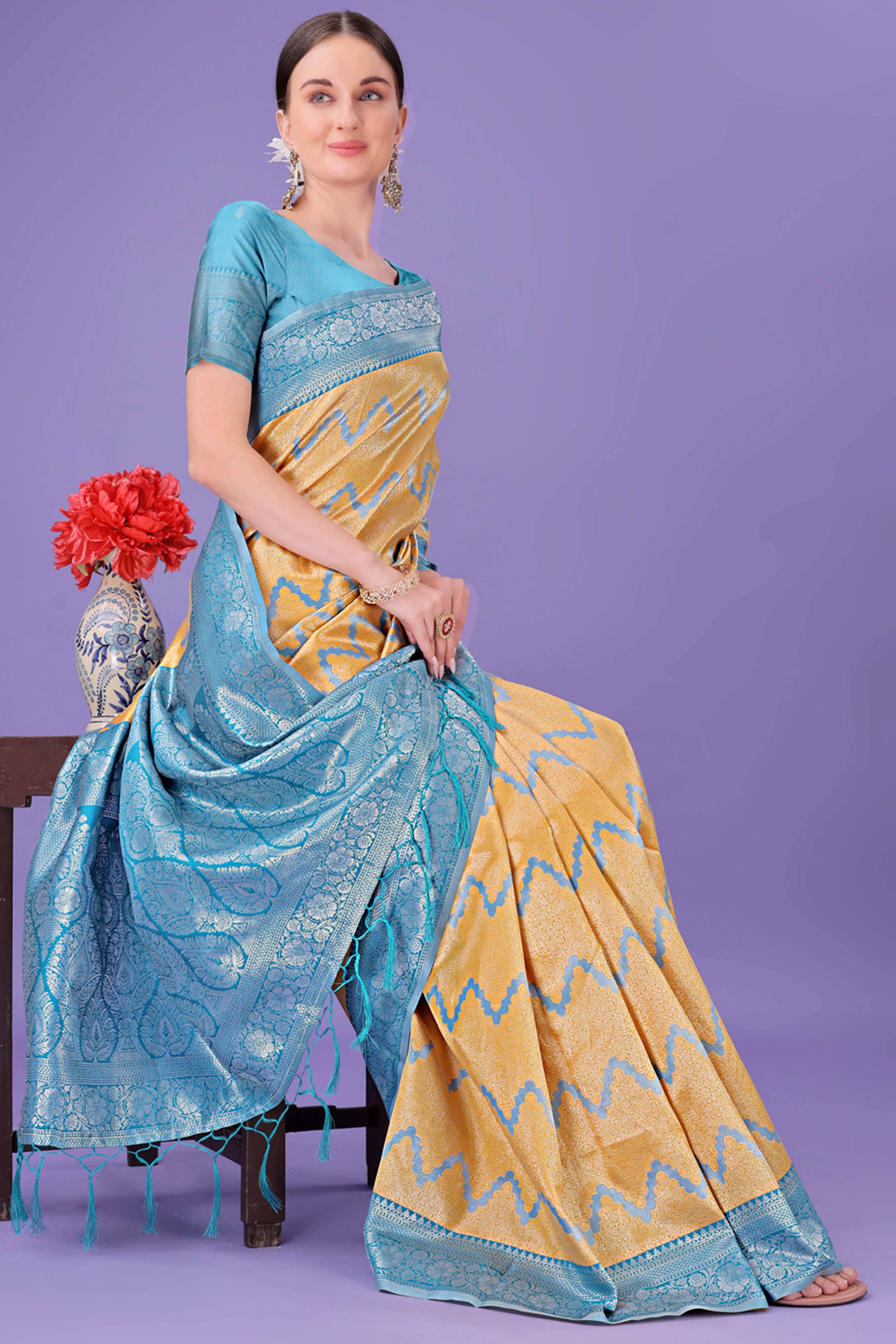 Yellow Lichi Cotton Silk Saree Adorned With Floral Zari Weave & Tassels