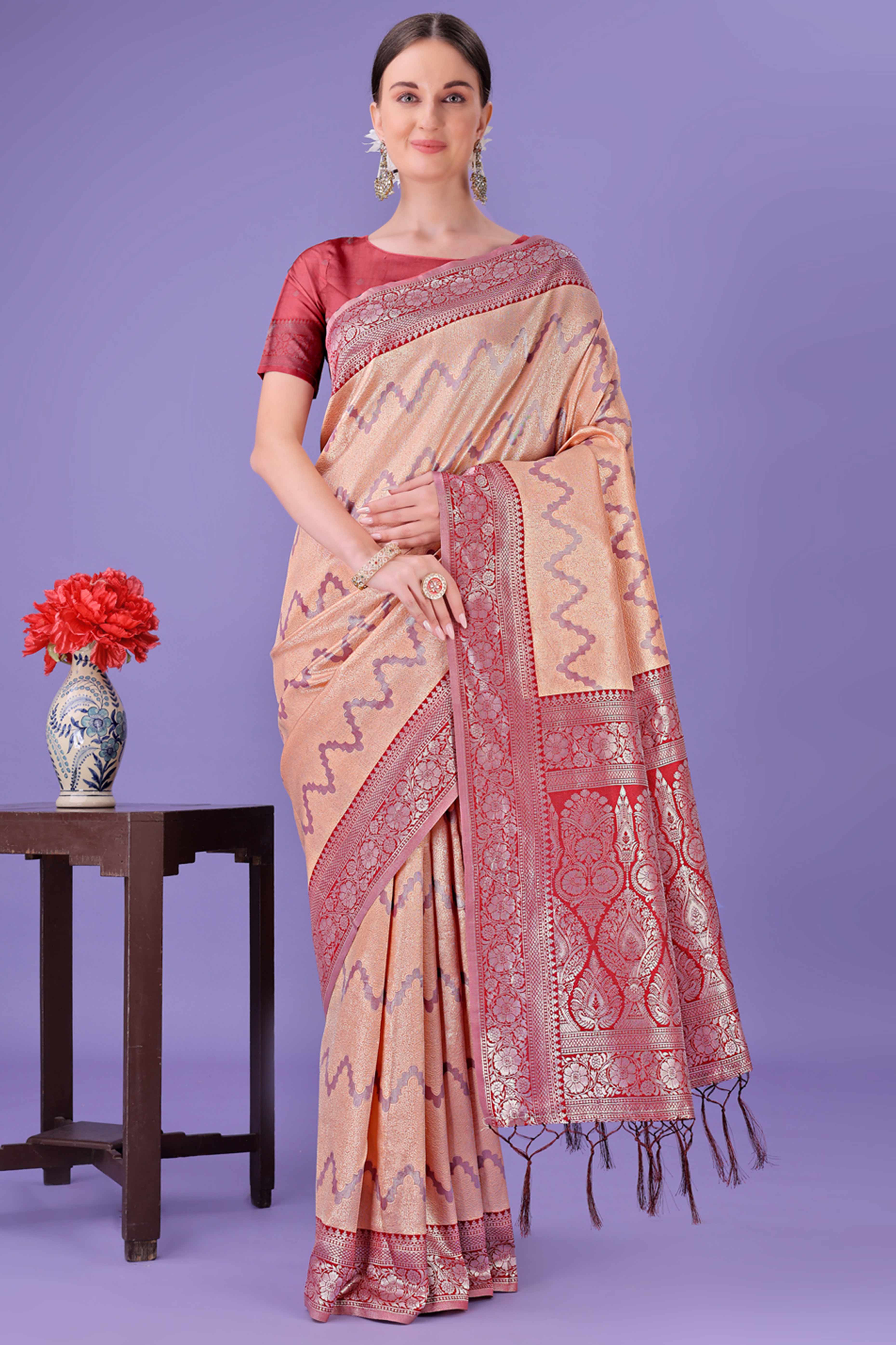 Peach Lichi Cotton Silk Saree Adorned With Floral Zari Weave & Tassels
