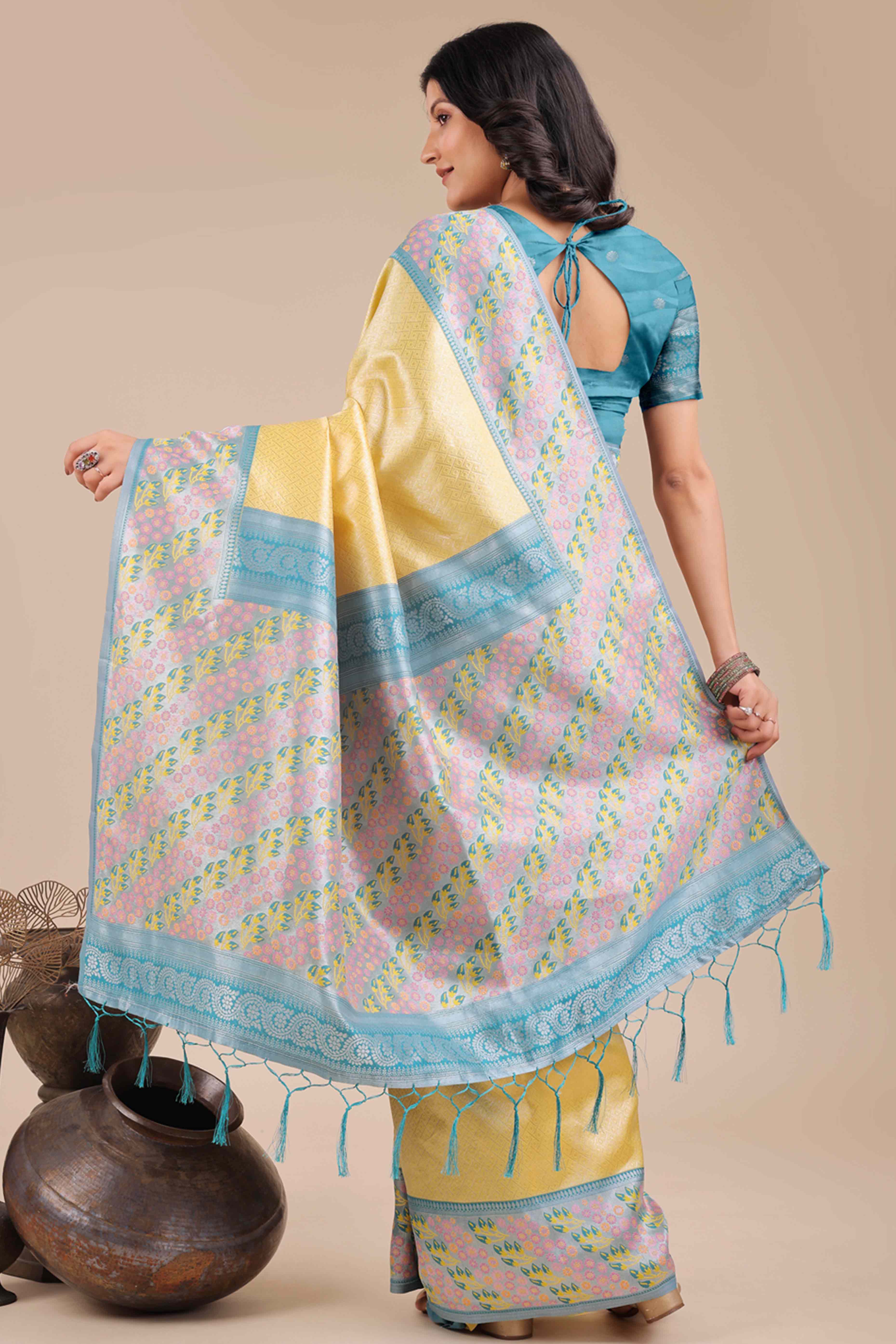 Yellow Silk Blend Saree Embellished With Zari Weaving & Tassel Accents
