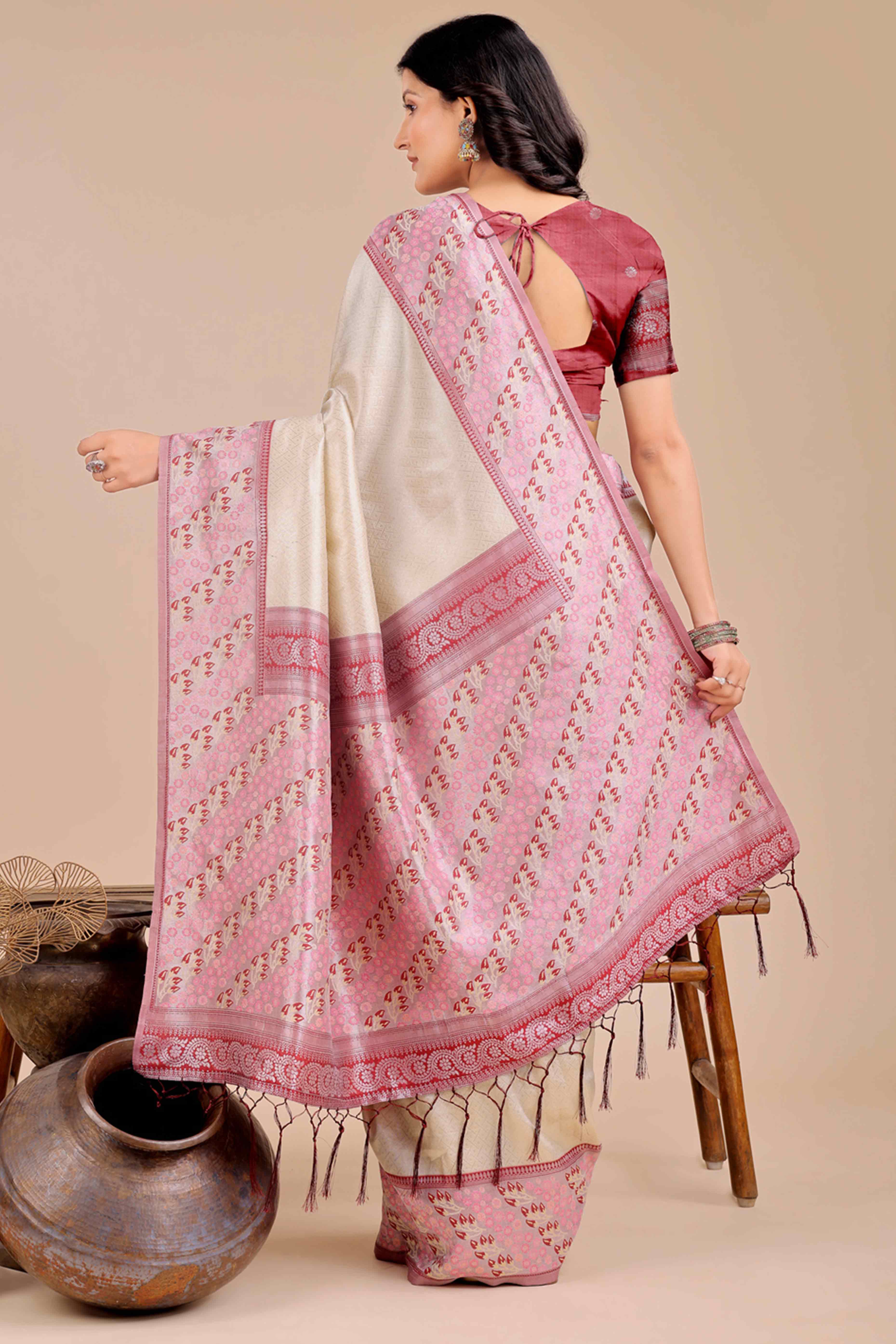 Cream Silk Blend Saree Embellished With Zari Weaving & Tassel Accents