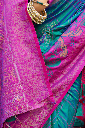 Graceful Morpich Blue Pochampally Silk Blend Saree Adorned With Floral Weaving & Tassel Pallu
