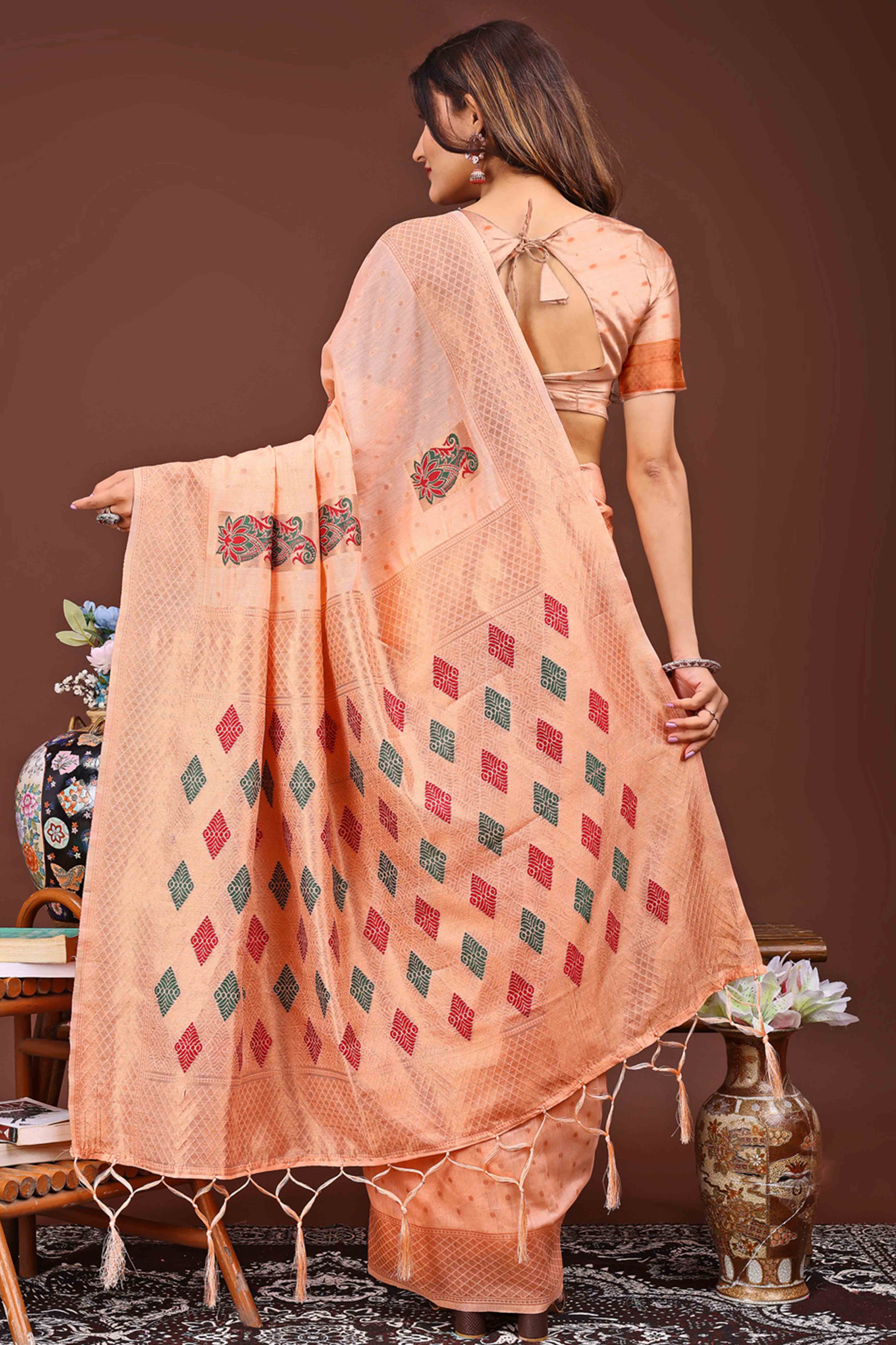 Light Orange Floral Zari Weaving Linen Cotton Saree With Tassel Pallu Accent