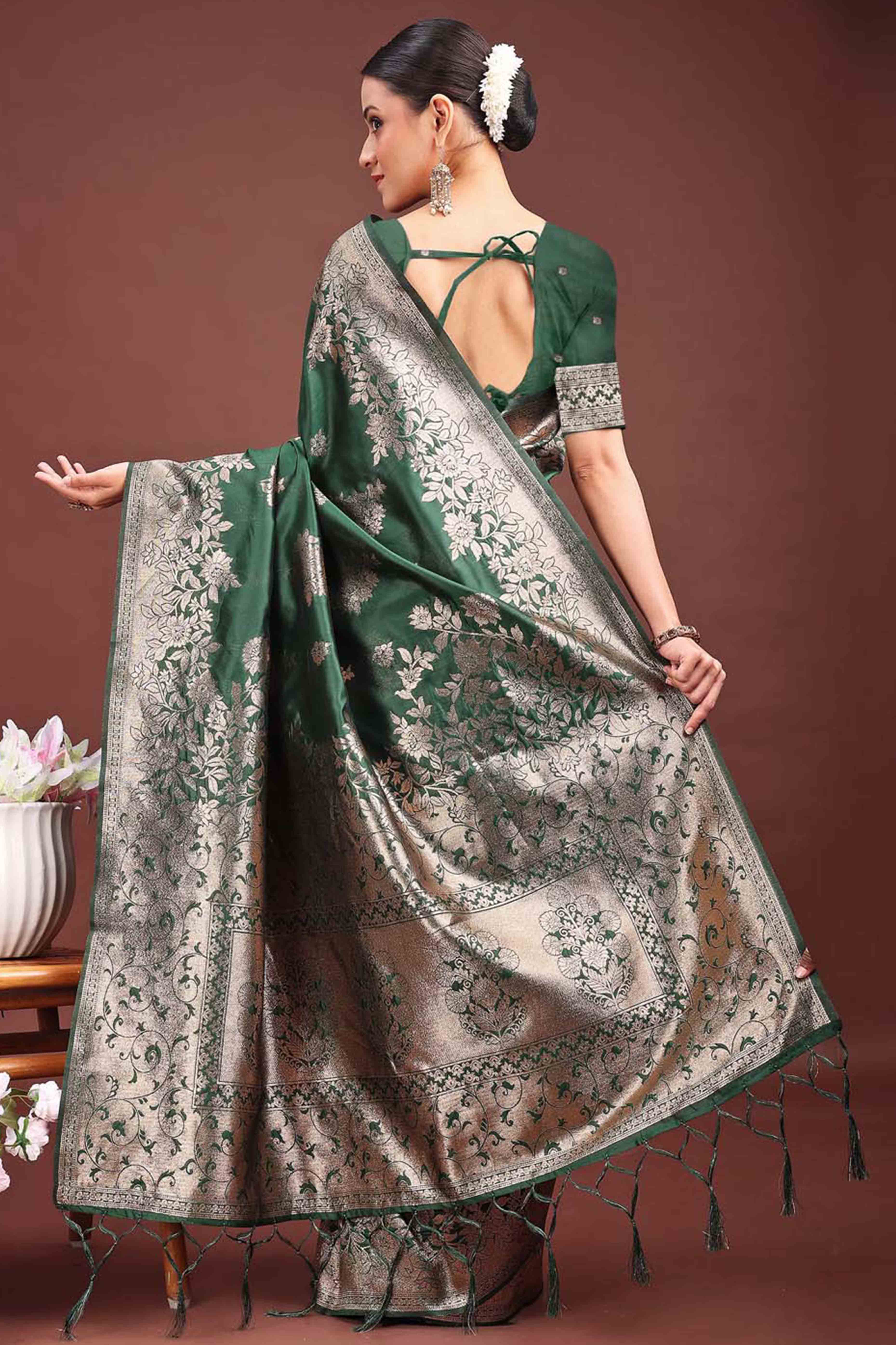 Dark Green Banarasi Silk Saree With Floral Zari Weaving & Elegant Tassels