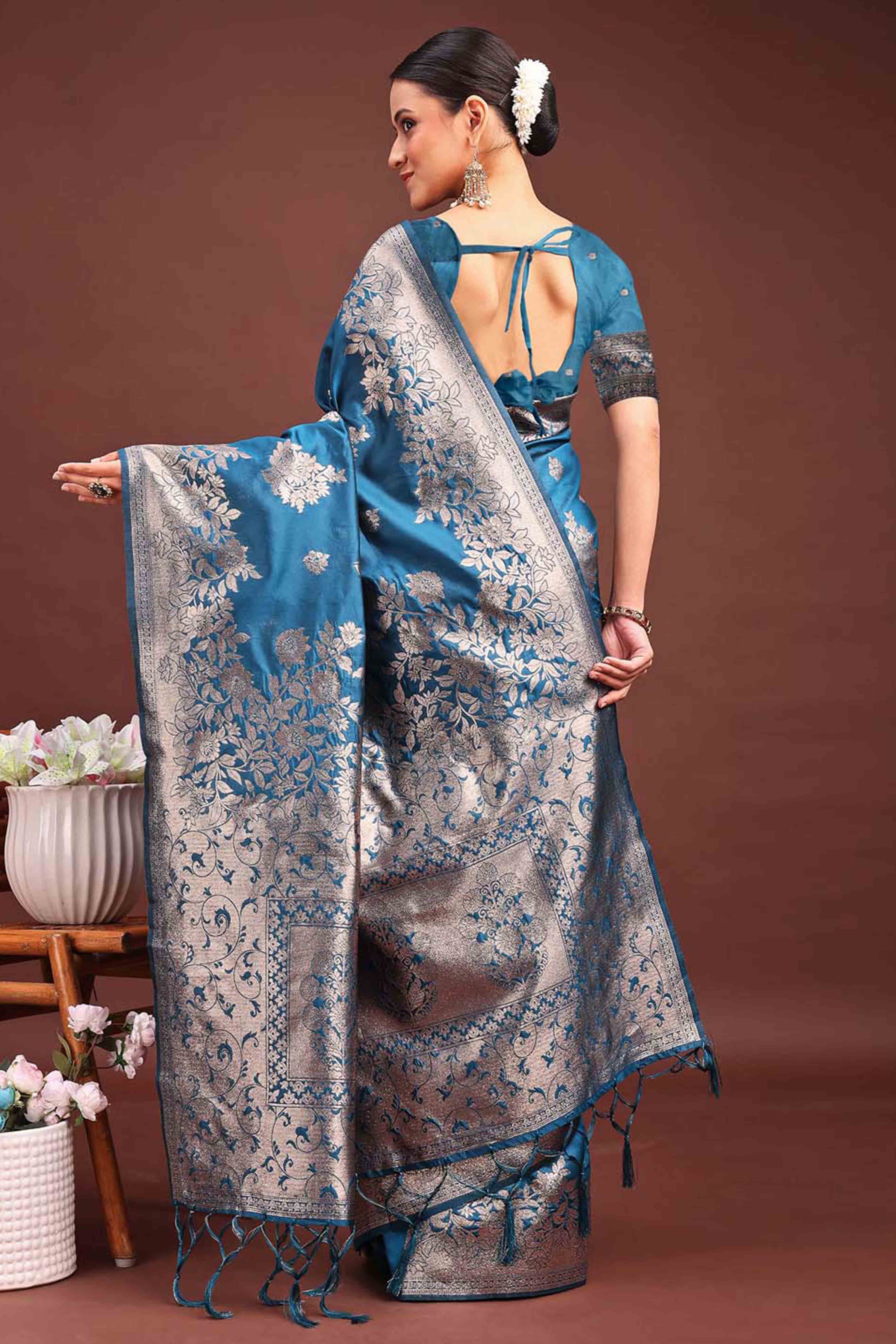 Deep Teal Blue Banarasi Silk Saree With Floral Zari Weaving & Elegant Tassels