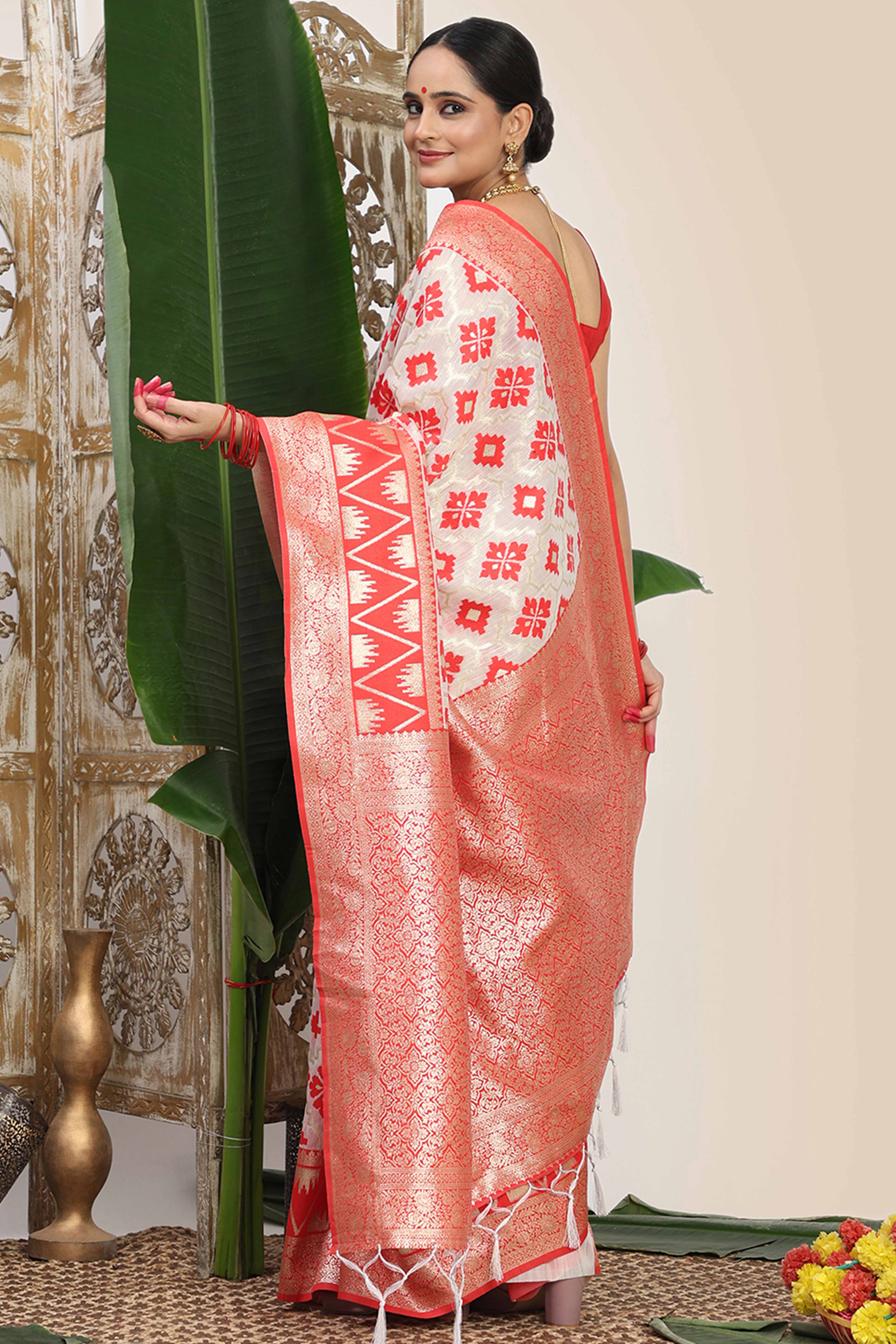 Vibrant White & Red Linen Cotton Saree Featuring Timeless Zari Weaving And Elegant Tassel Pallu