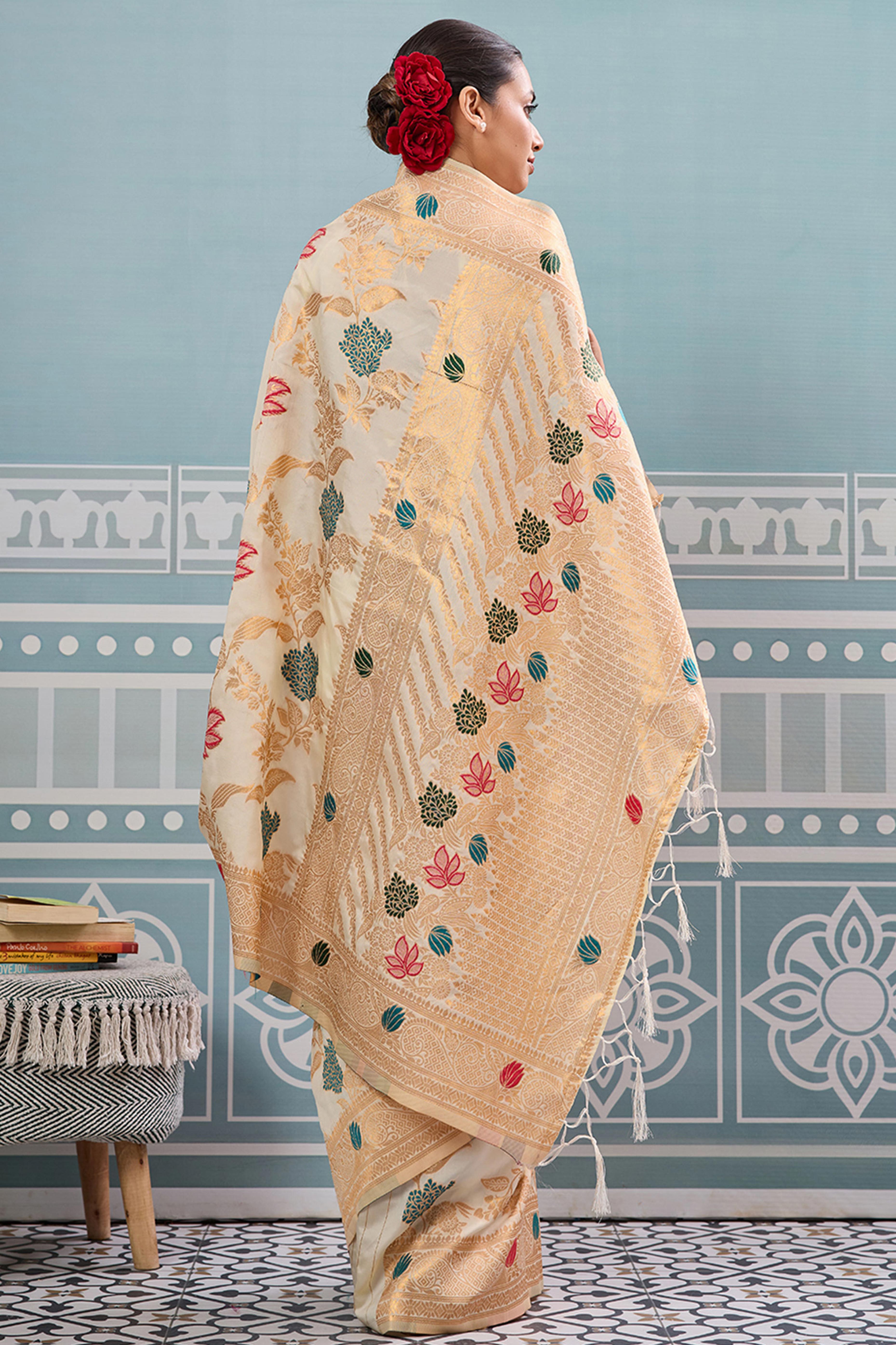 Radiant Cream Silk Blend Saree Adorned With Intricate Floral Zari Weaving & Tassel Pallu
