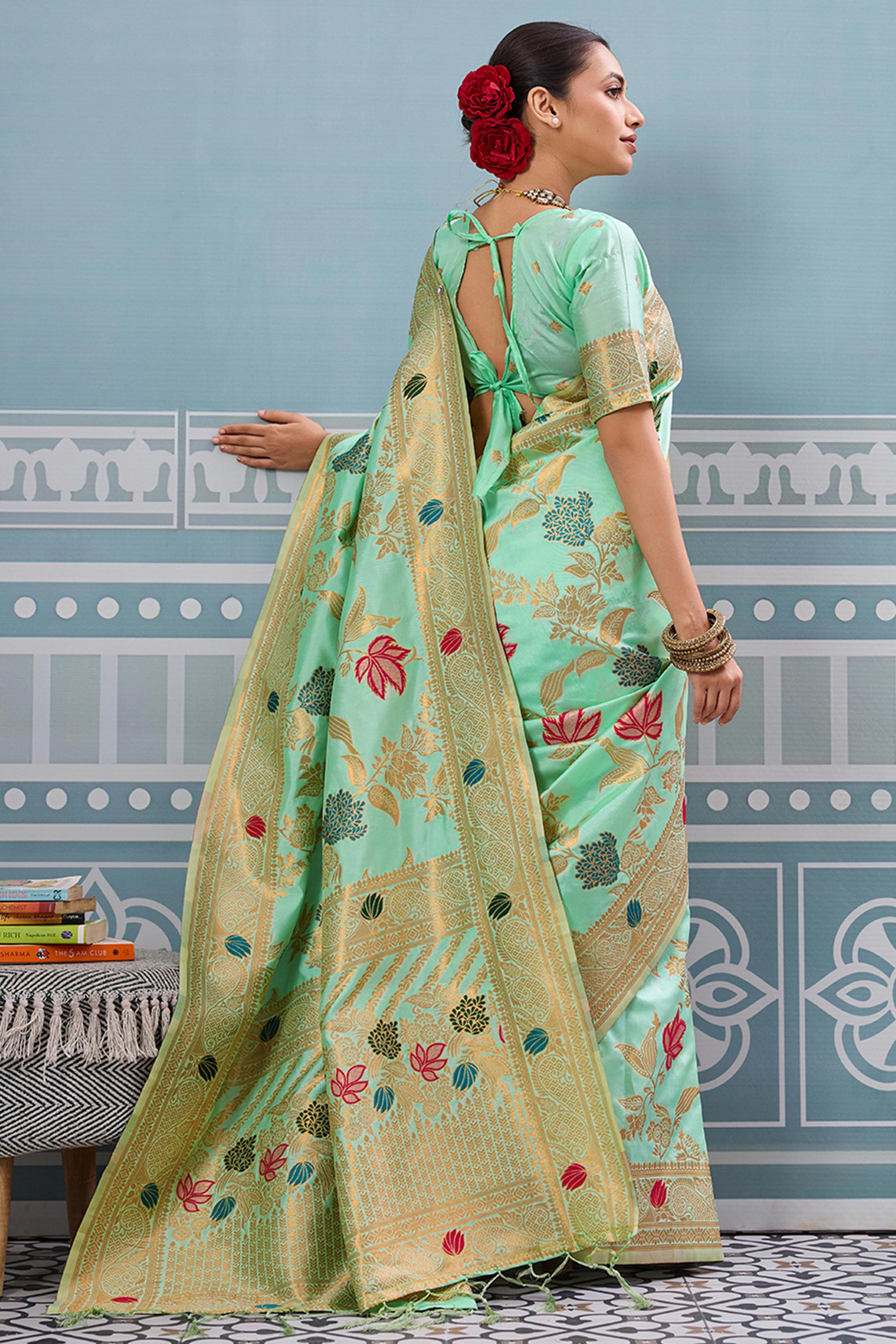 Radiant Sea Green Silk Blend Saree Adorned With Intricate Floral Zari Weaving & Tassel Pallu