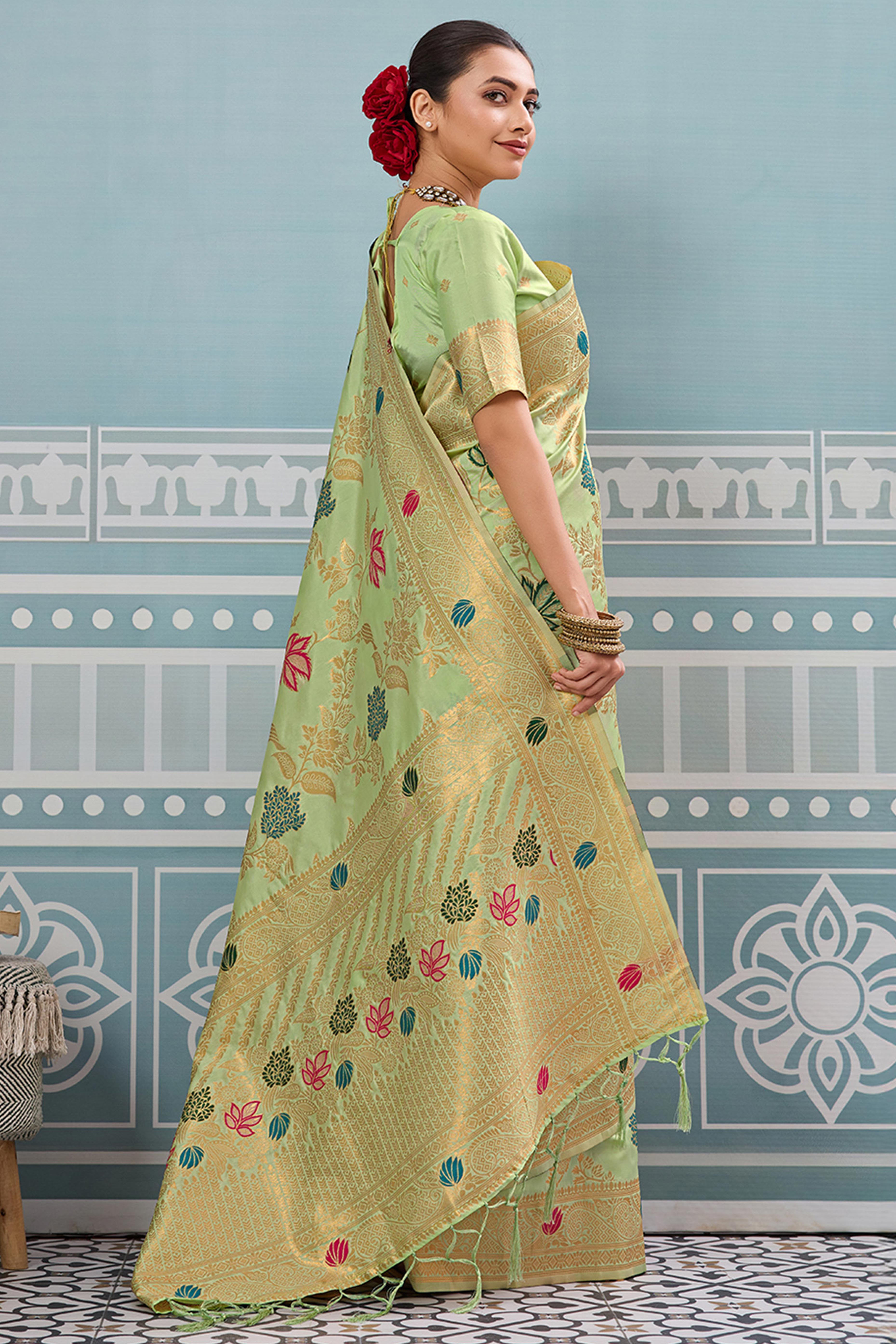 Radiant Pista Green Silk Blend Saree Adorned With Intricate Floral Zari Weaving & Tassel Pallu