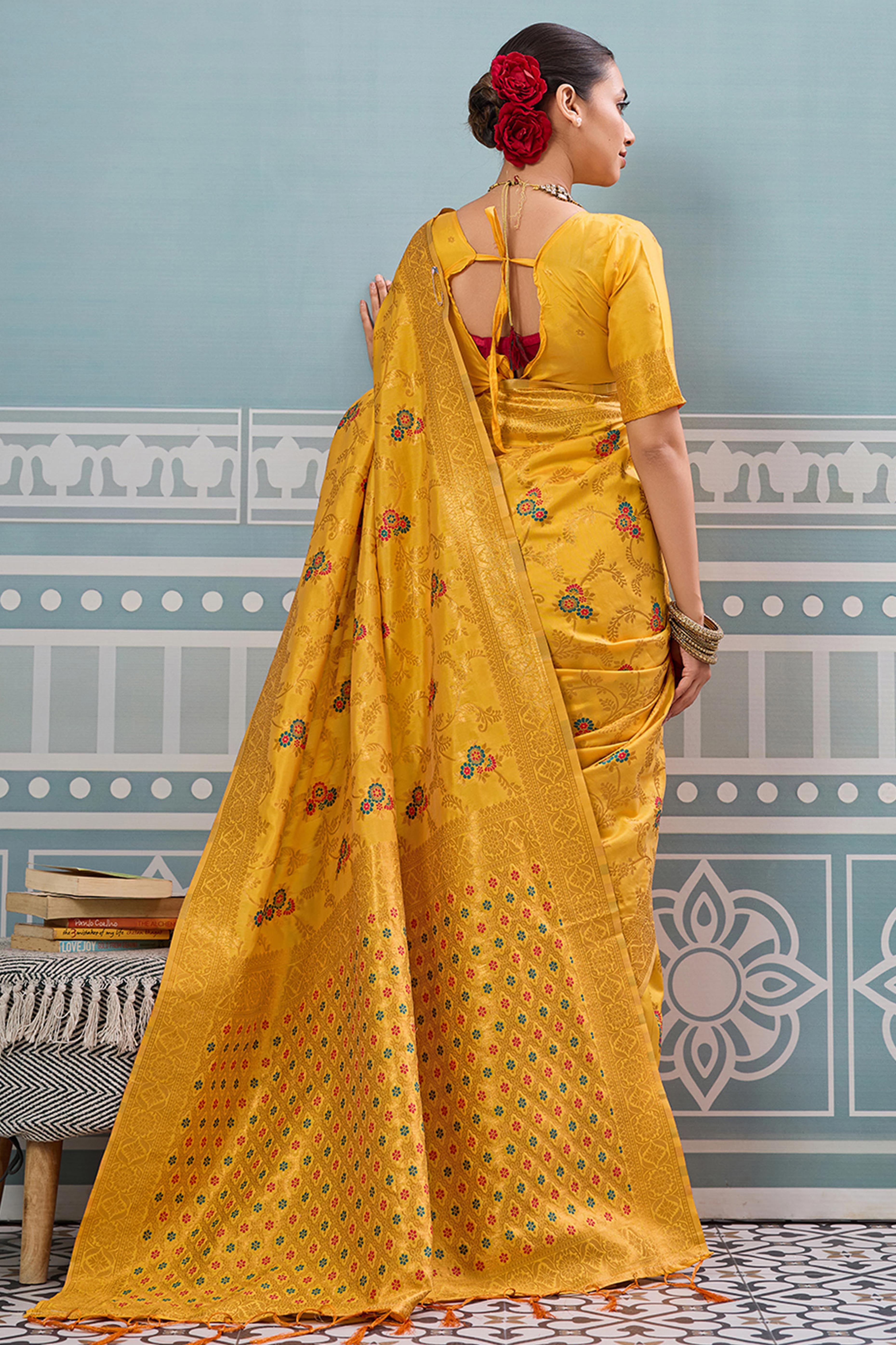 Majestic Bloom Yellow Floral Zari Weaving Silk Blend Saree With Elegant Tassel Pallu