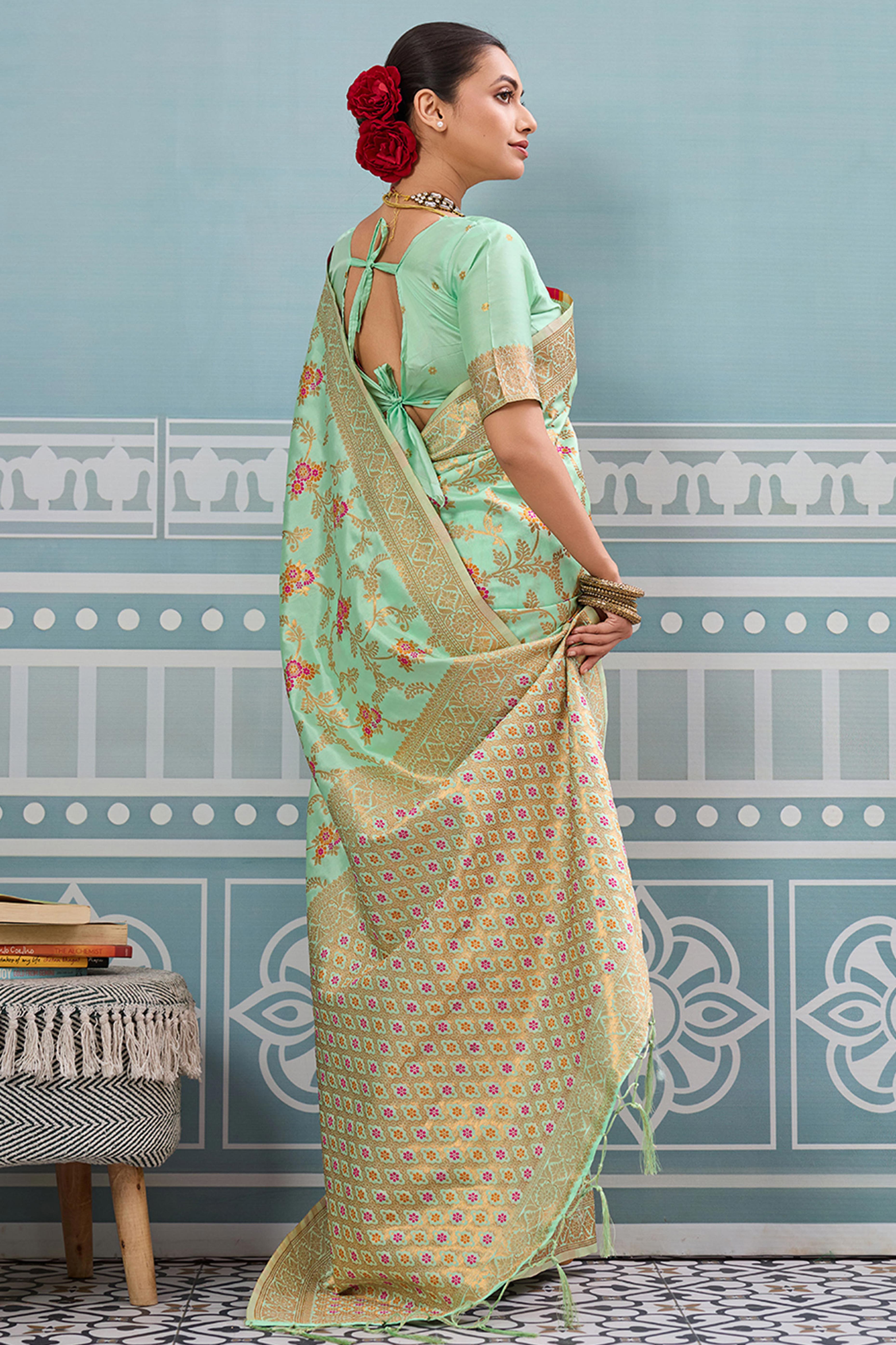 Majestic Bloom Sea Green Floral Zari Weaving Silk Blend Saree With Elegant Tassel Pallu