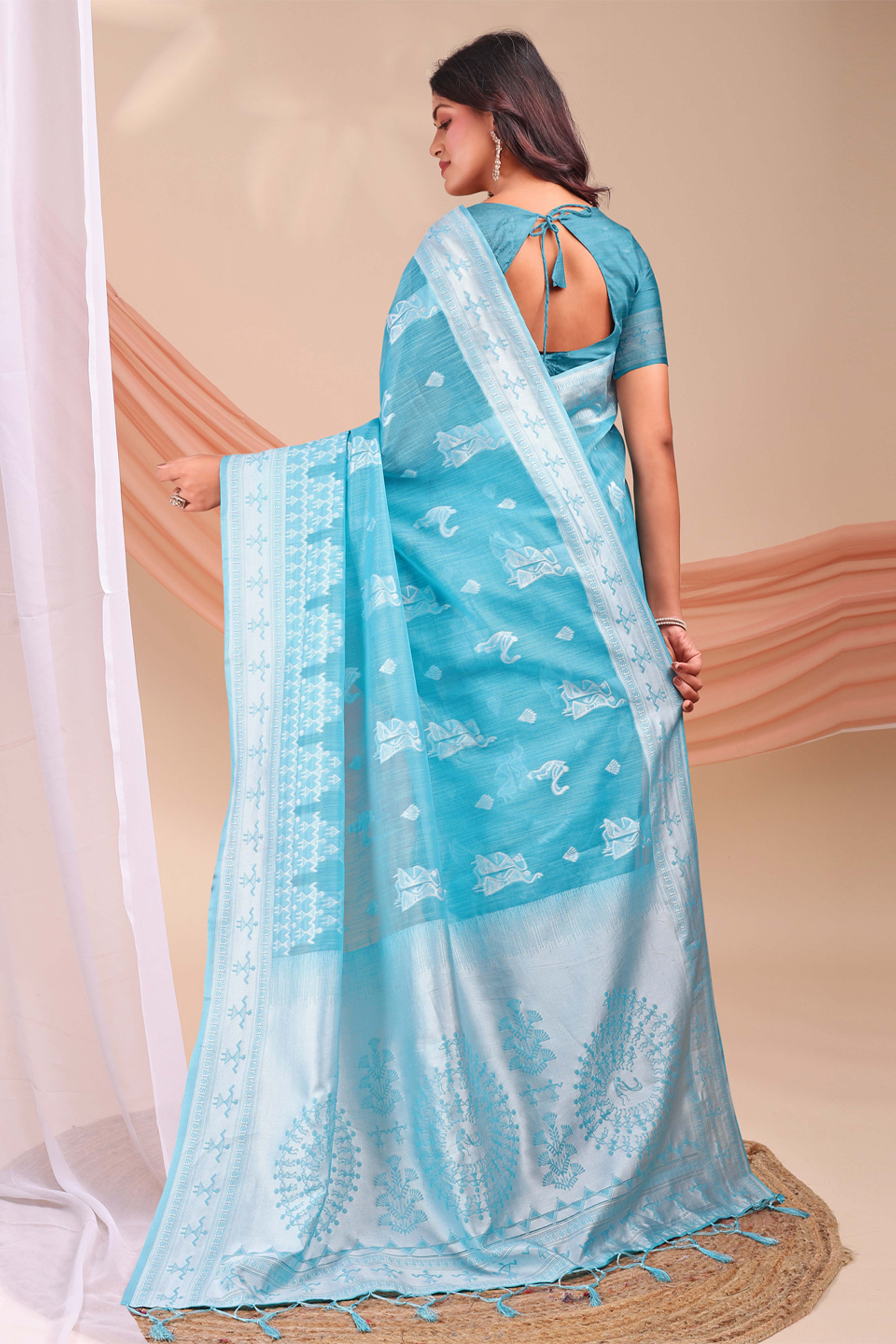 Sky Blue Ethnic Saree in Soft Linen Cotton Fabric Featuring Warli Art Weaving