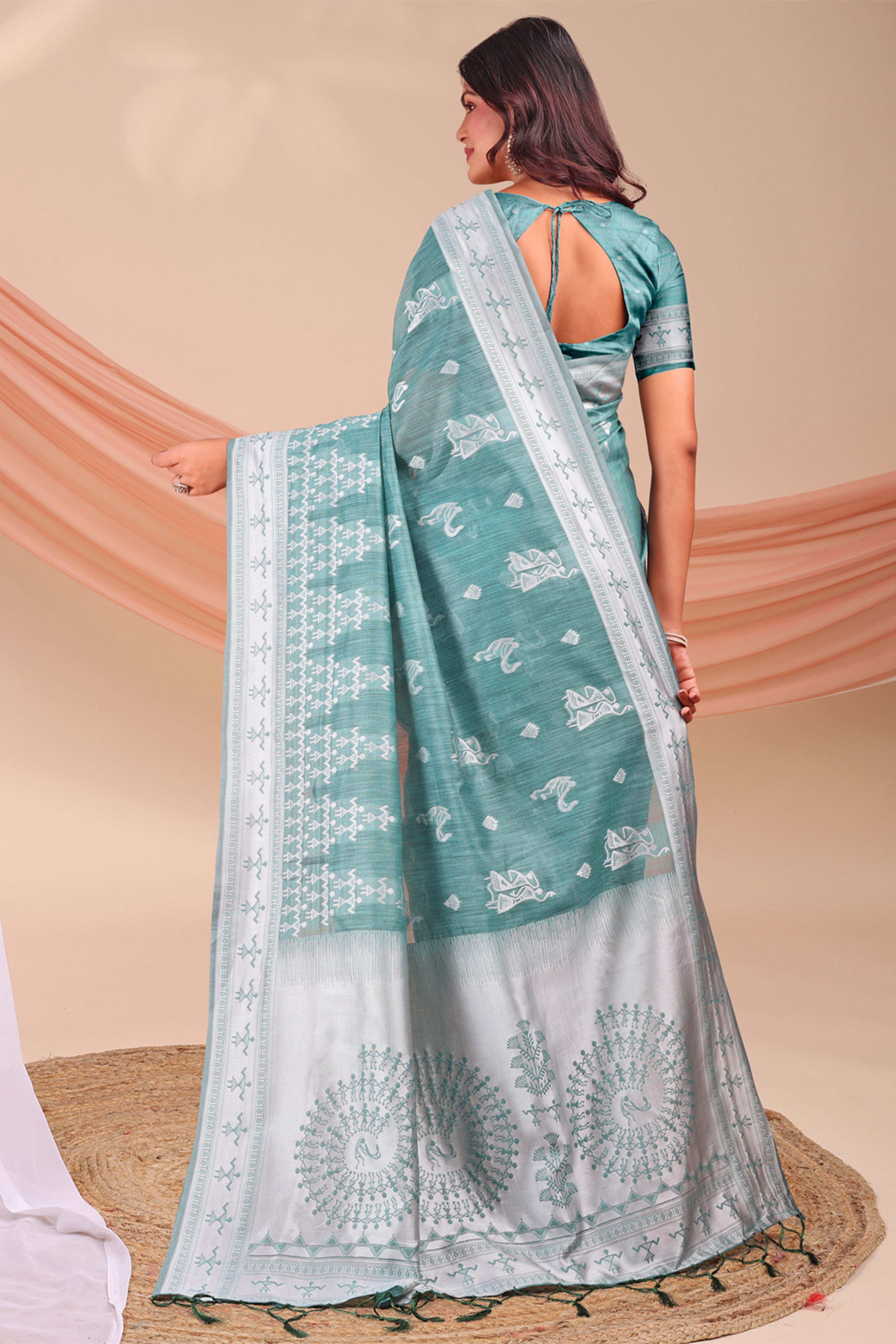 Sea Green Ethnic Saree in Soft Linen Cotton Fabric Featuring Warli Art Weaving
