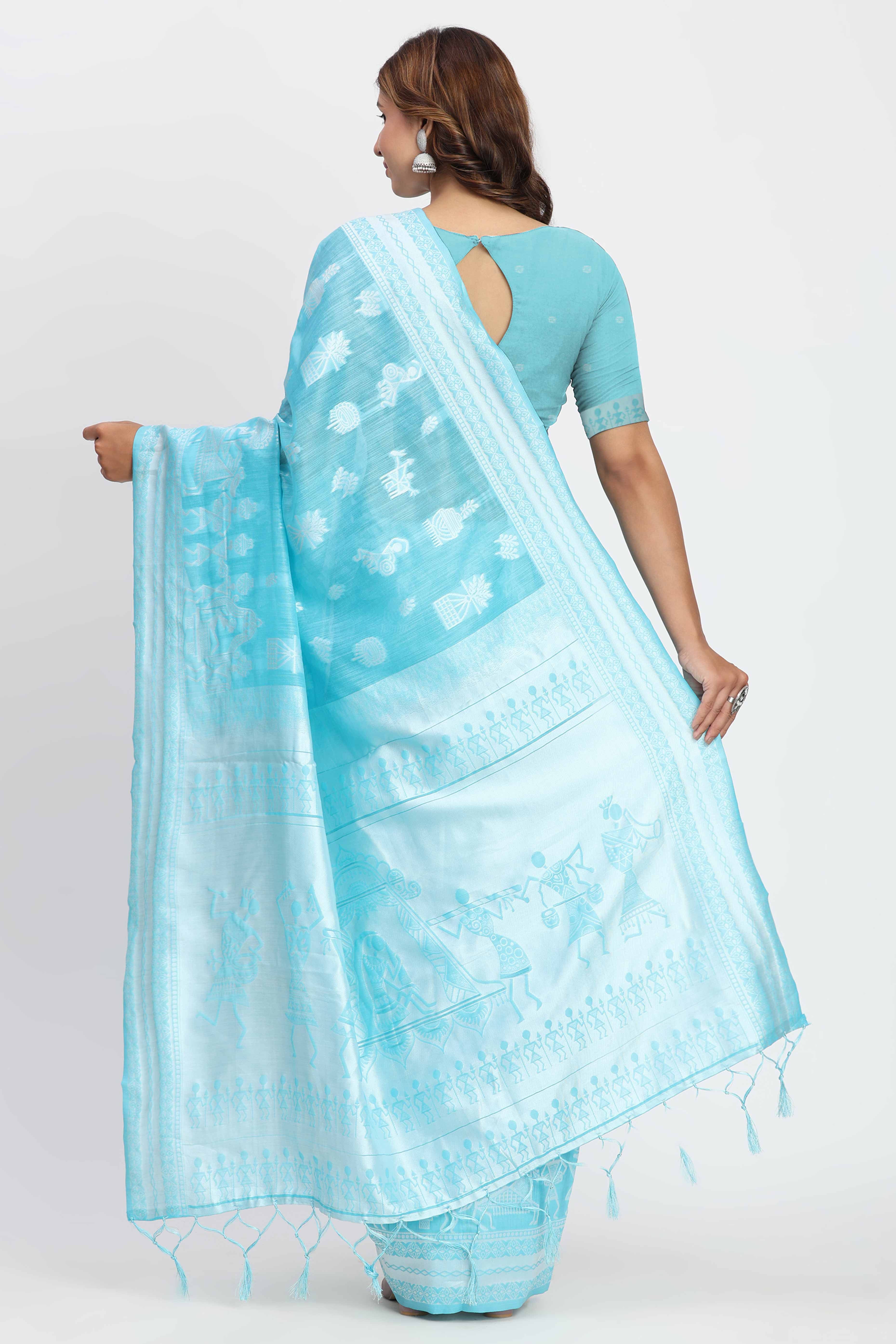 Blue Linen Cotton Saree Showcasing Traditional Warli Motifs In Zari Weaving With Tassel Pallu
