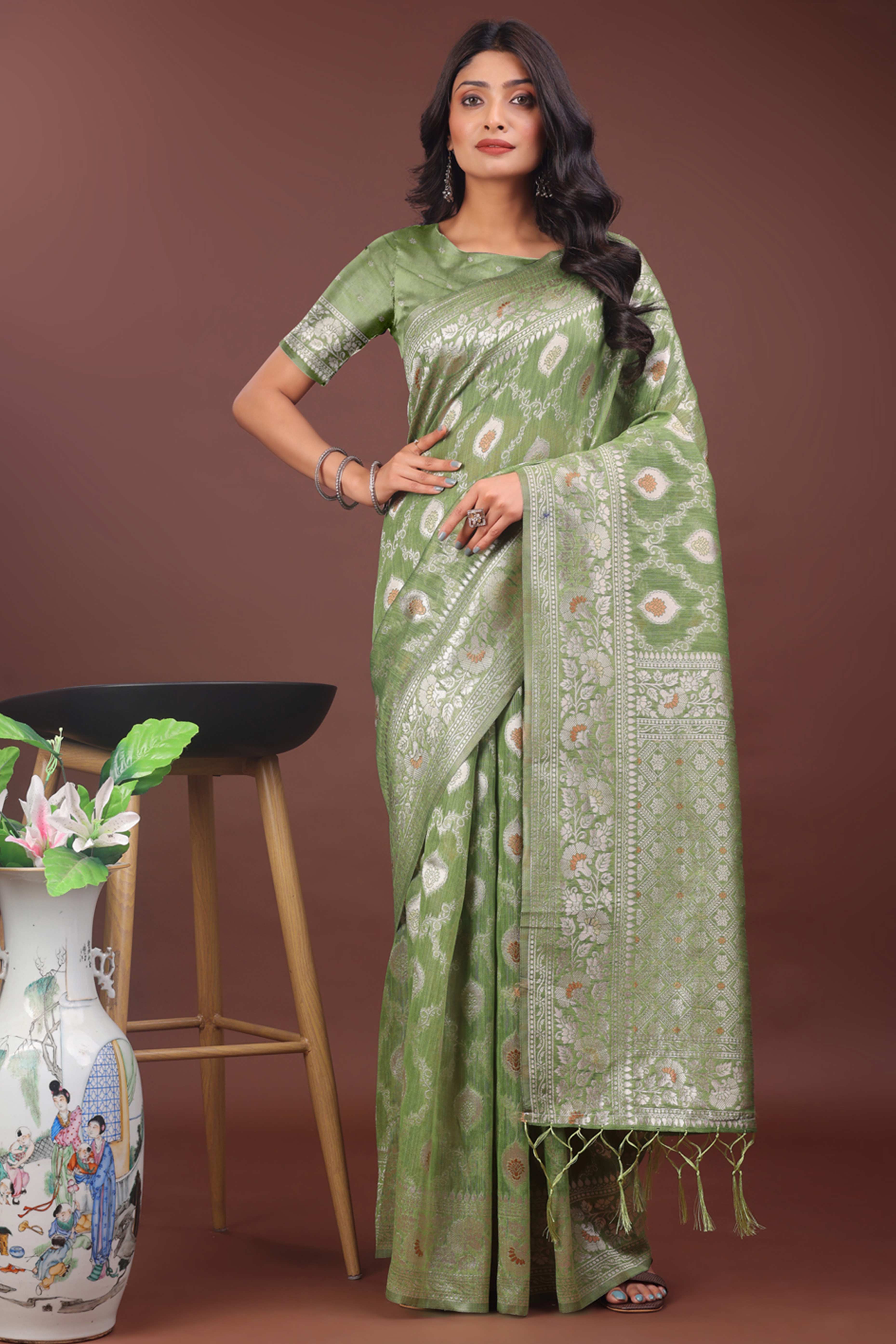 Light Green Cotton Blend Saree with Banarasi Style Floral Artistry and Tassels
