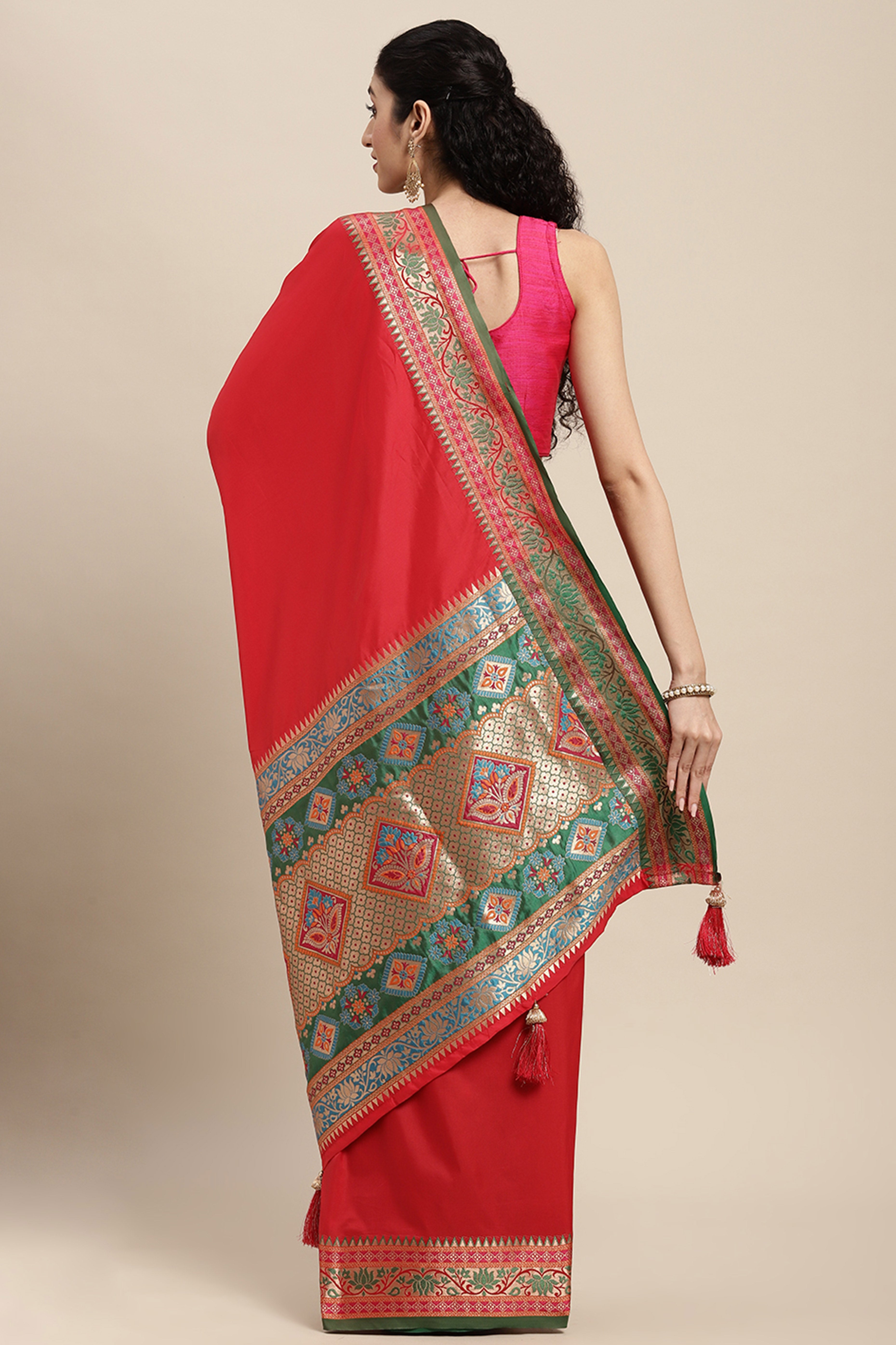 Graceful Red Solid Saree Highlighted With Floral Zari Weaving On Silk Blend & Tassel Pallu