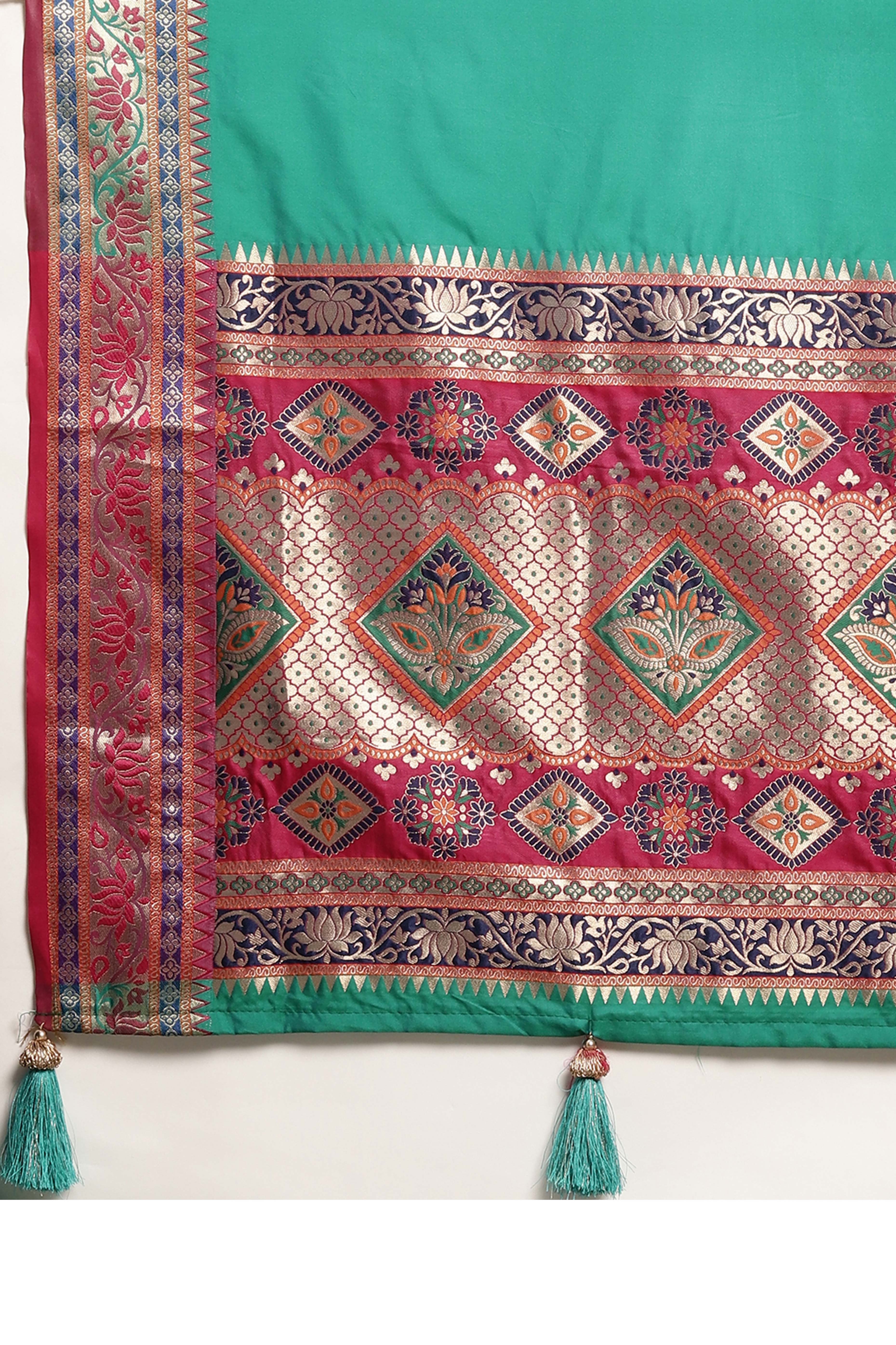 Graceful Rama Green Solid Saree Highlighted With Floral Zari Weaving On Silk Blend & Tassel Pallu