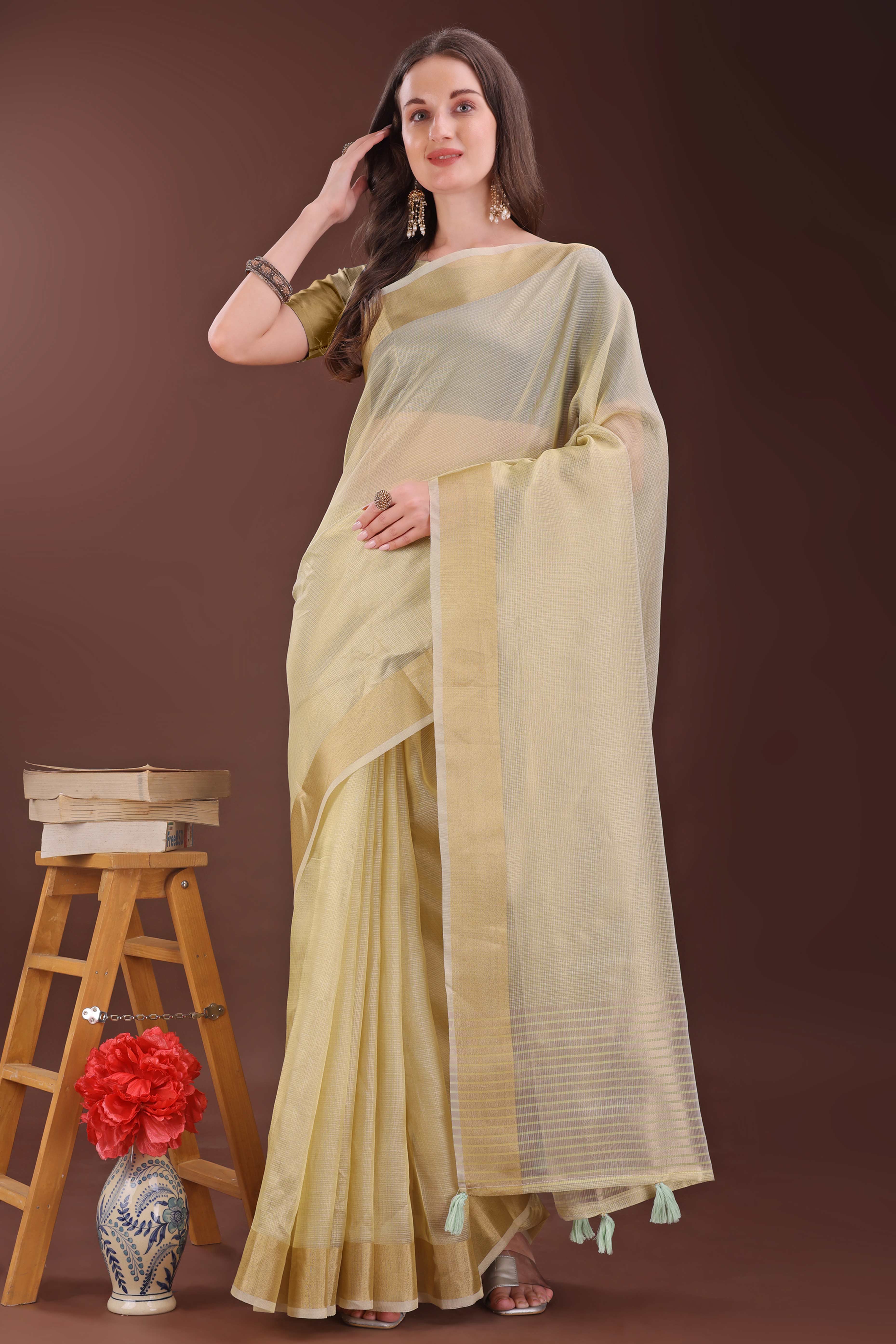 Light Yellow Zari Woven Organza Saree With Graceful Tassel Border