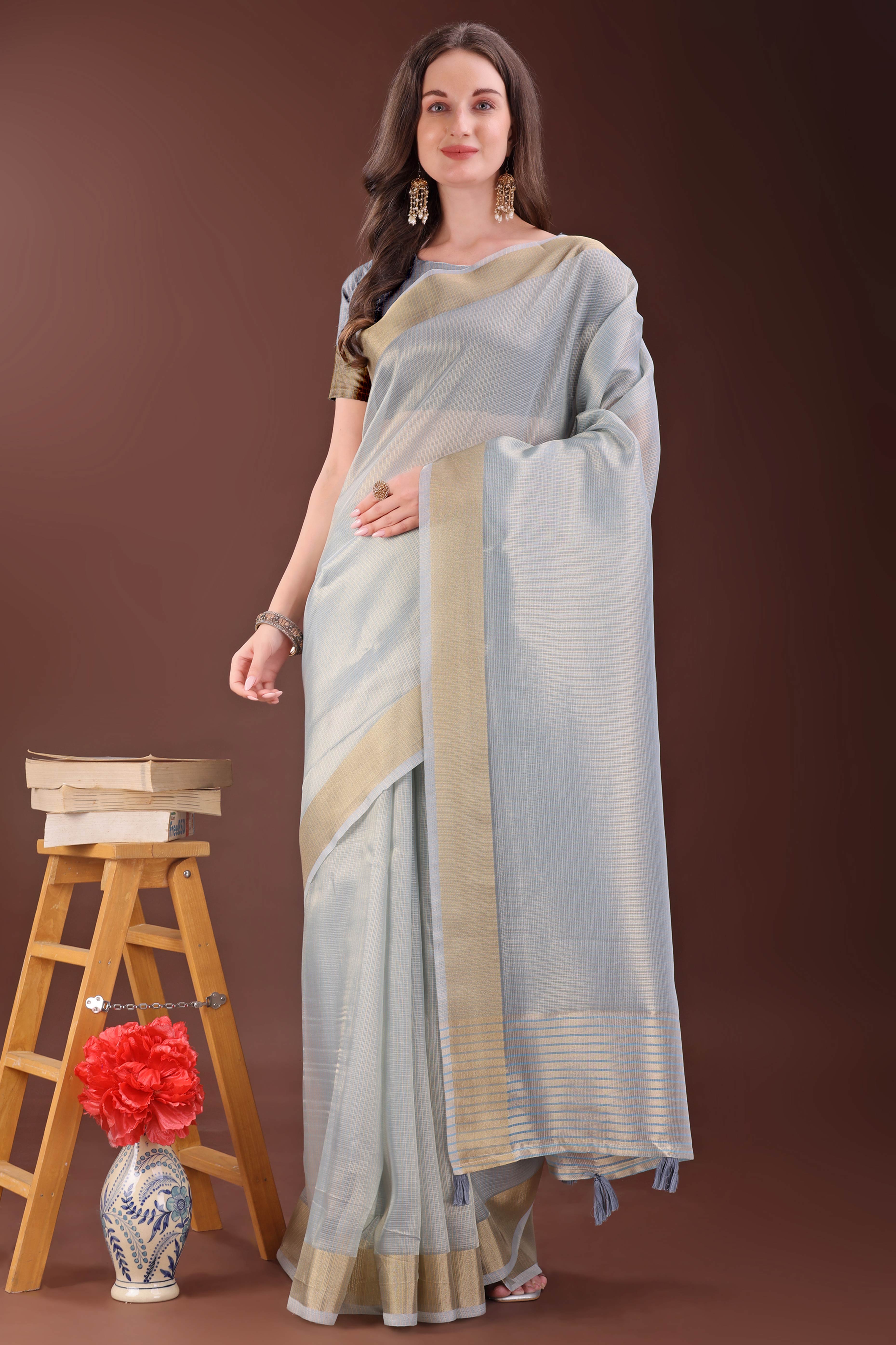 Grey Zari Woven Organza Saree With Graceful Tassel Border