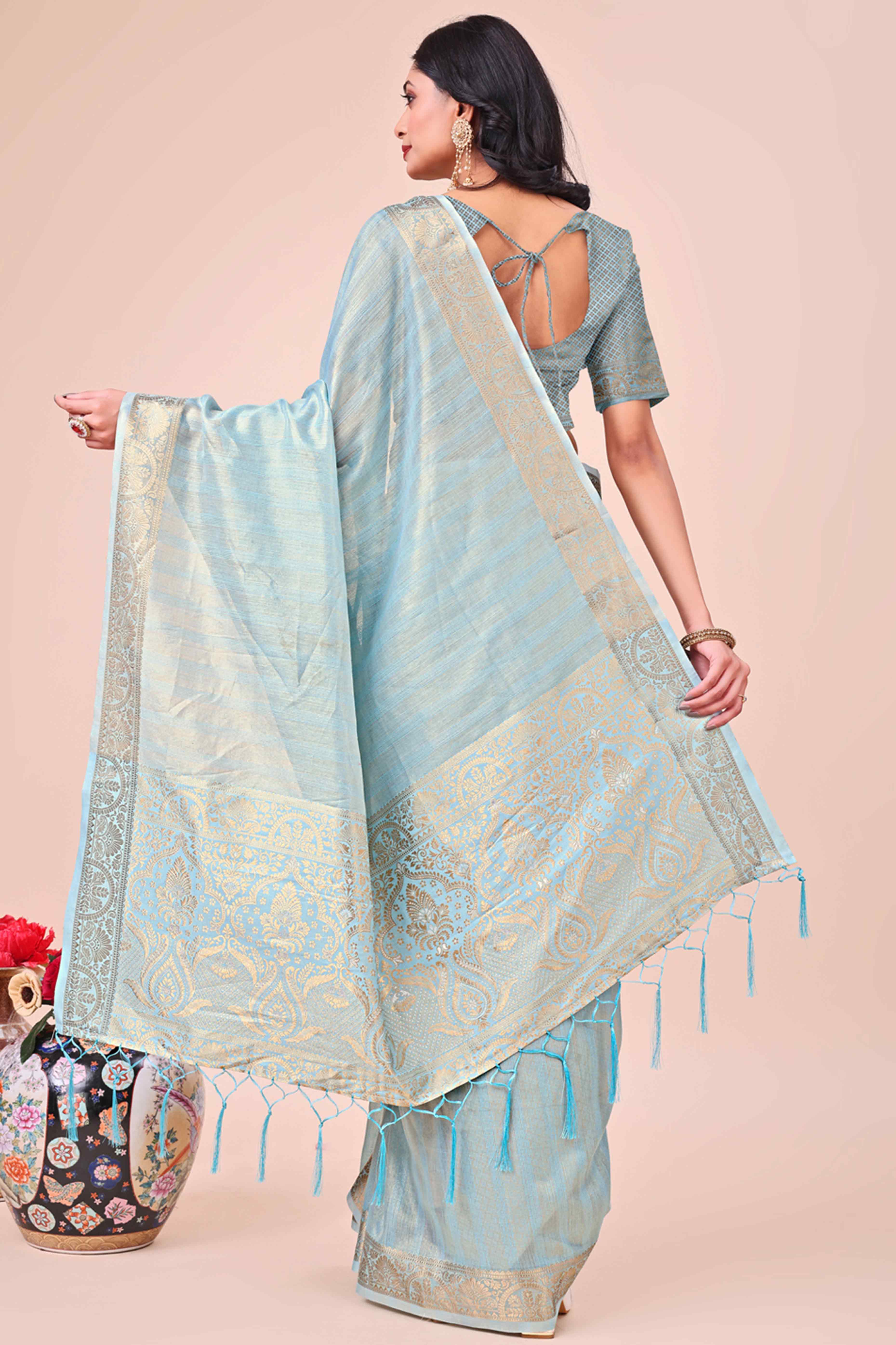 Sky Blue Organza Saree With Floral Zari Weave & Tassel Accents
