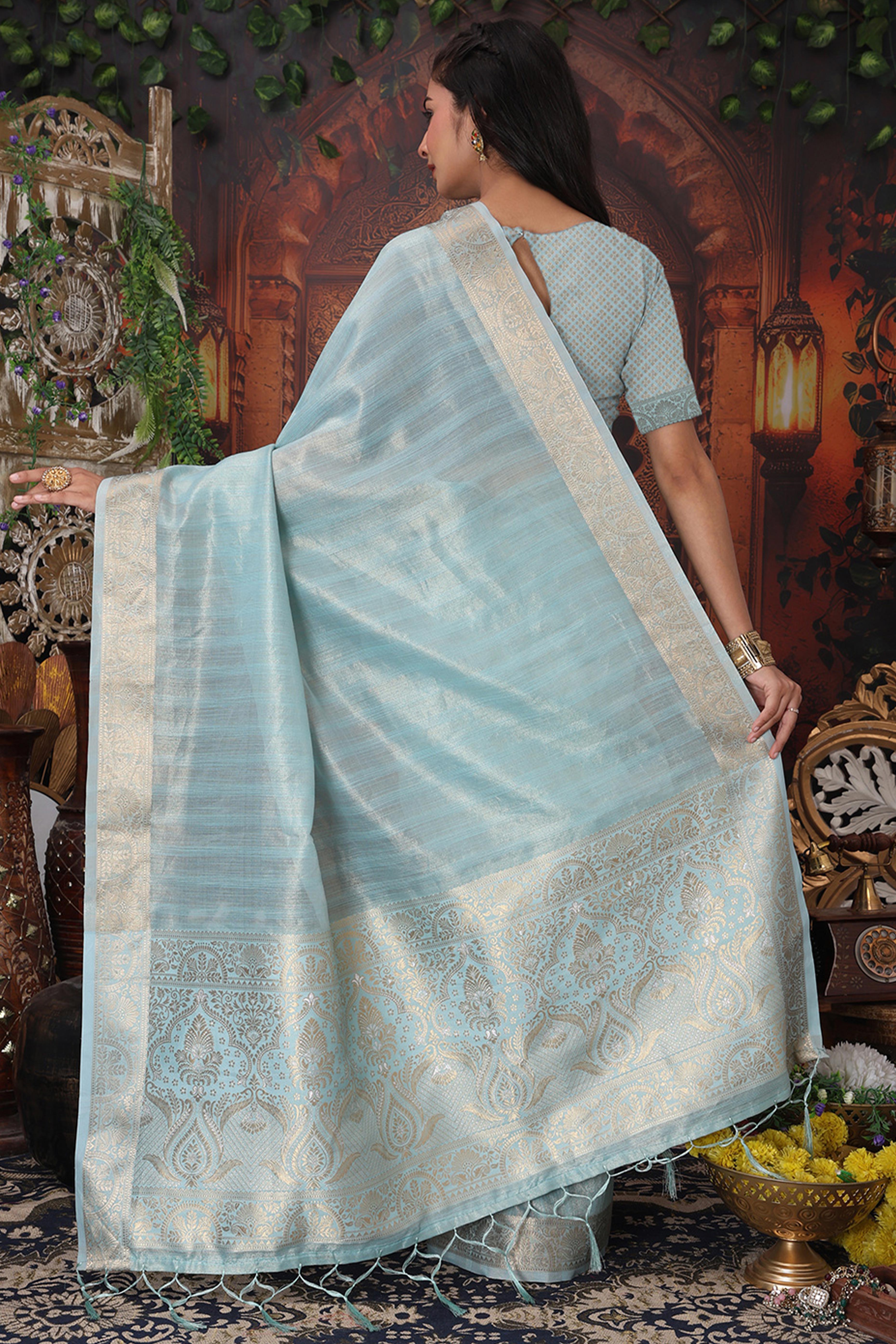 Sky Blue Organza Saree Adorned With Floral Zari Weaving & Graceful Tassel Pallu