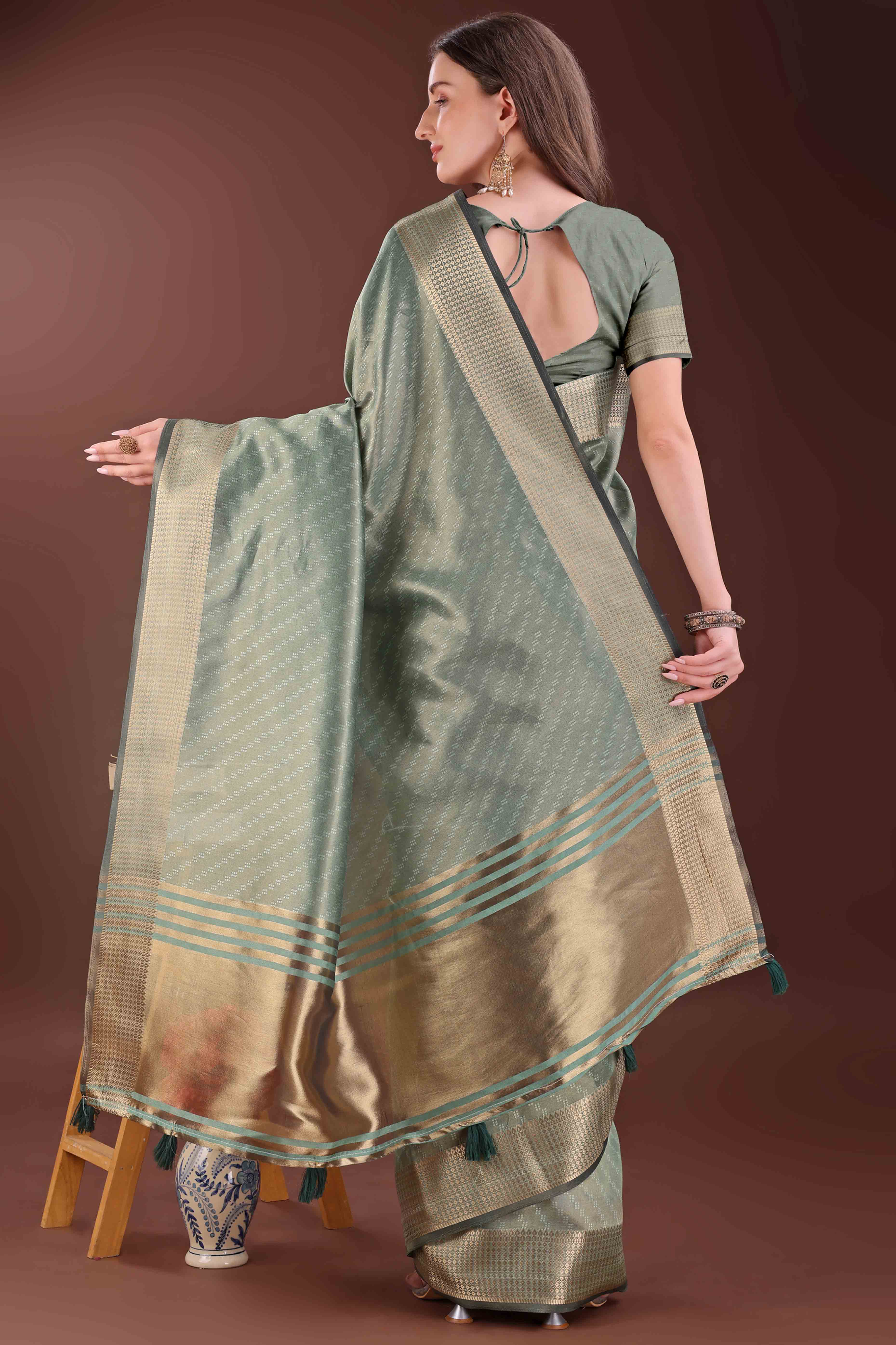 Green Zari Weaving Organza Saree With Tassel Border