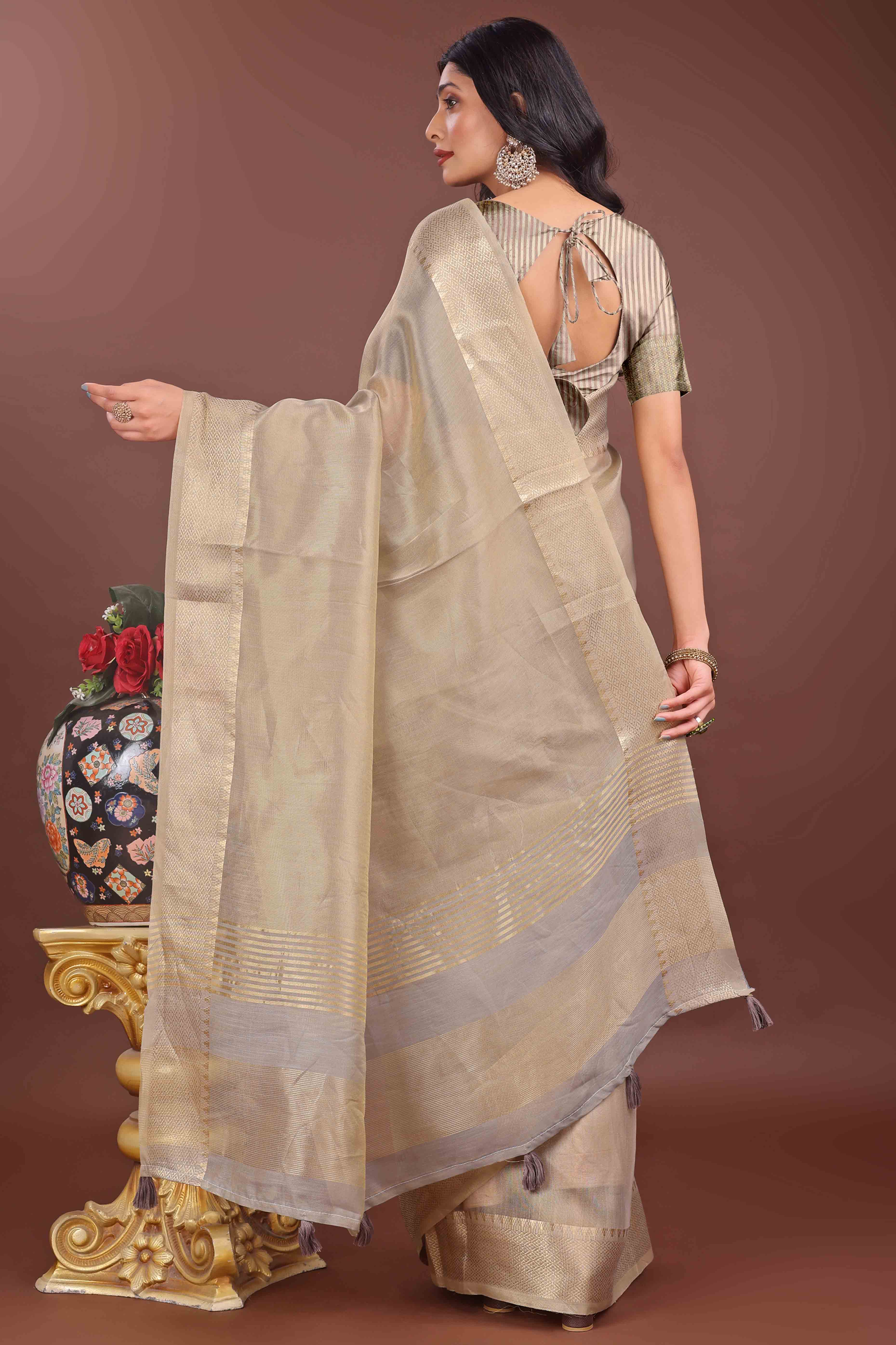Beige Solid With Zari Woven Organza Saree With Tassel Border