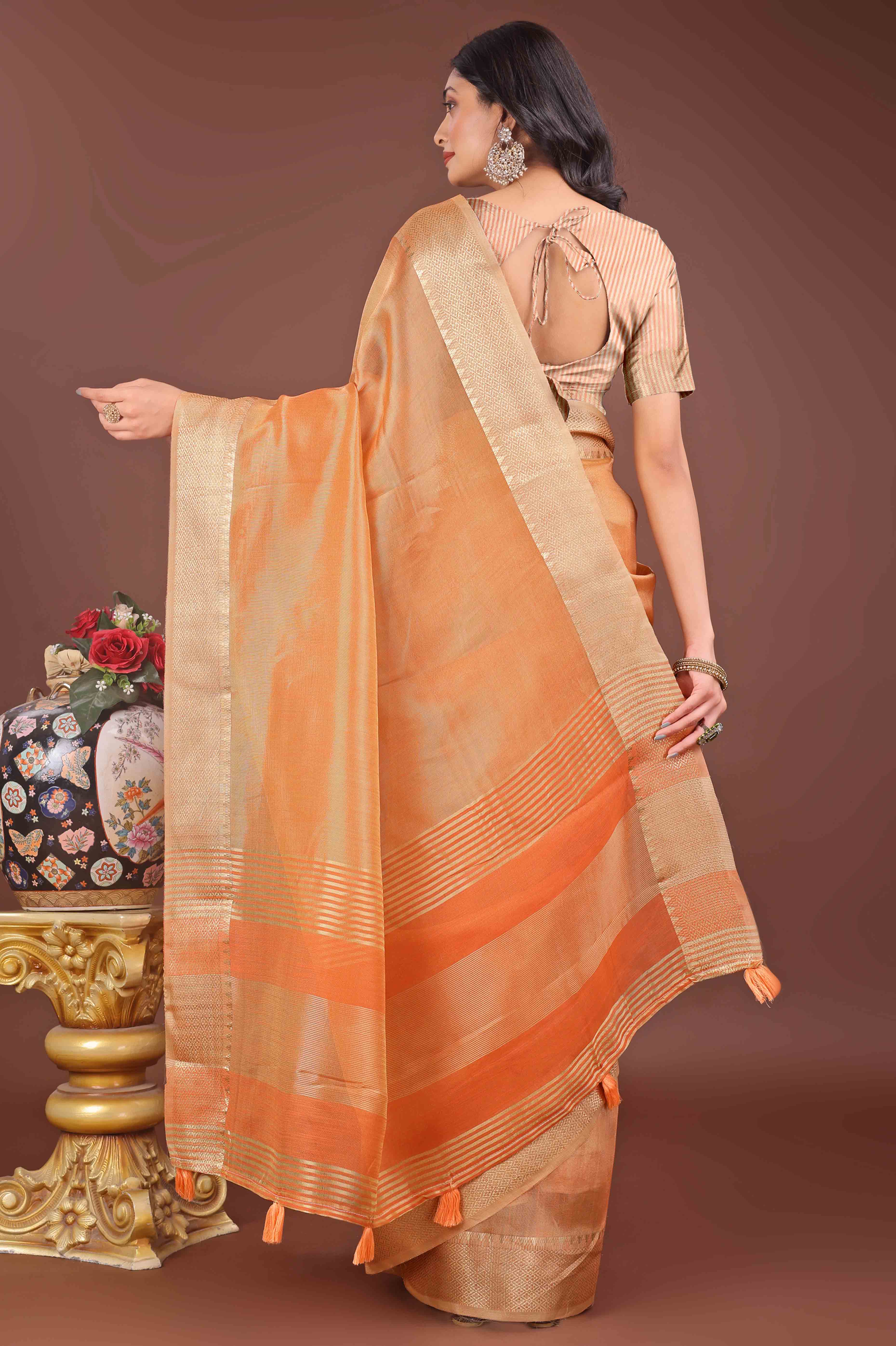 Orange Solid With Zari Woven Organza Saree With Tassel Border