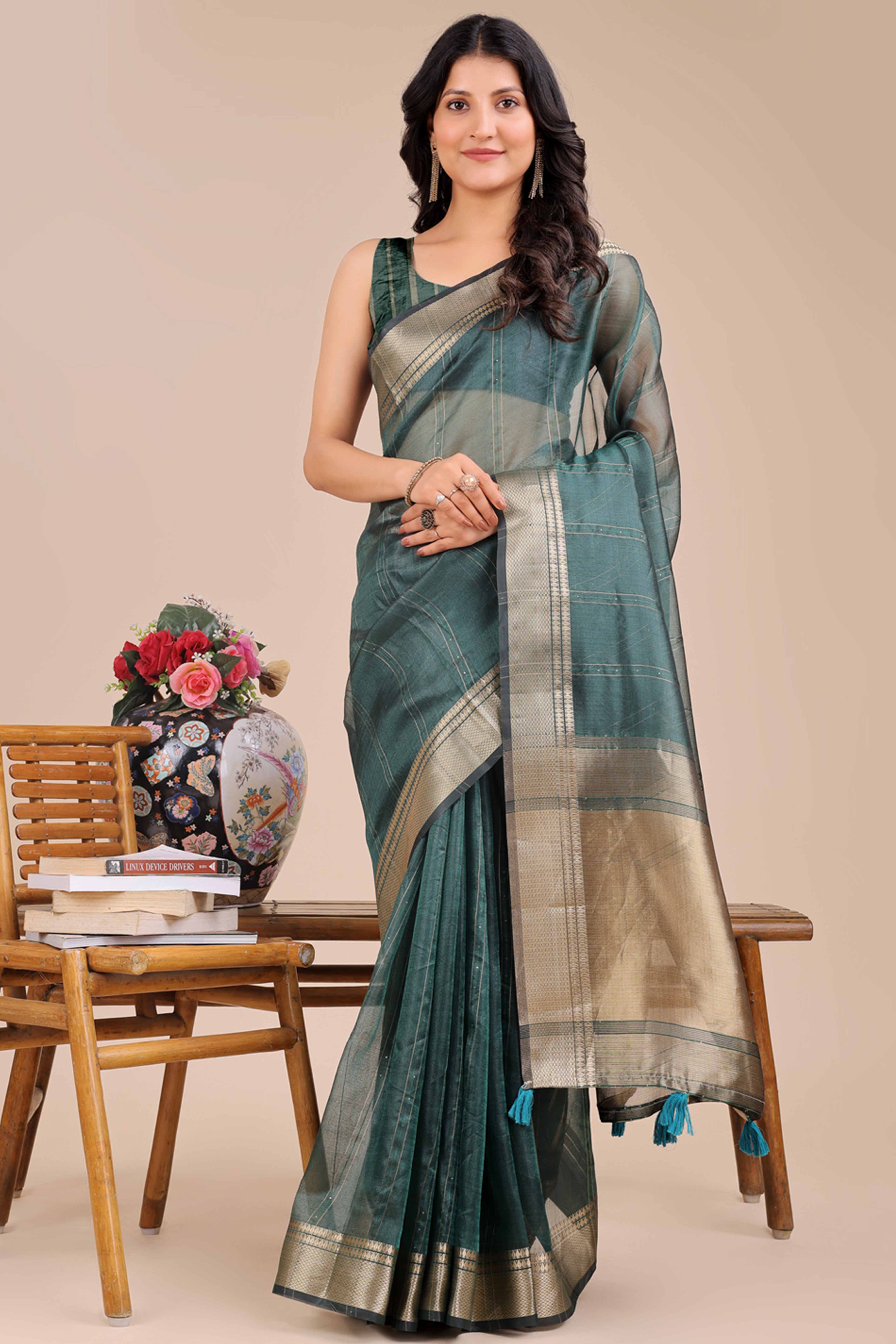Dark Green Hue Organza Saree with Shimmering Zari Border Weave