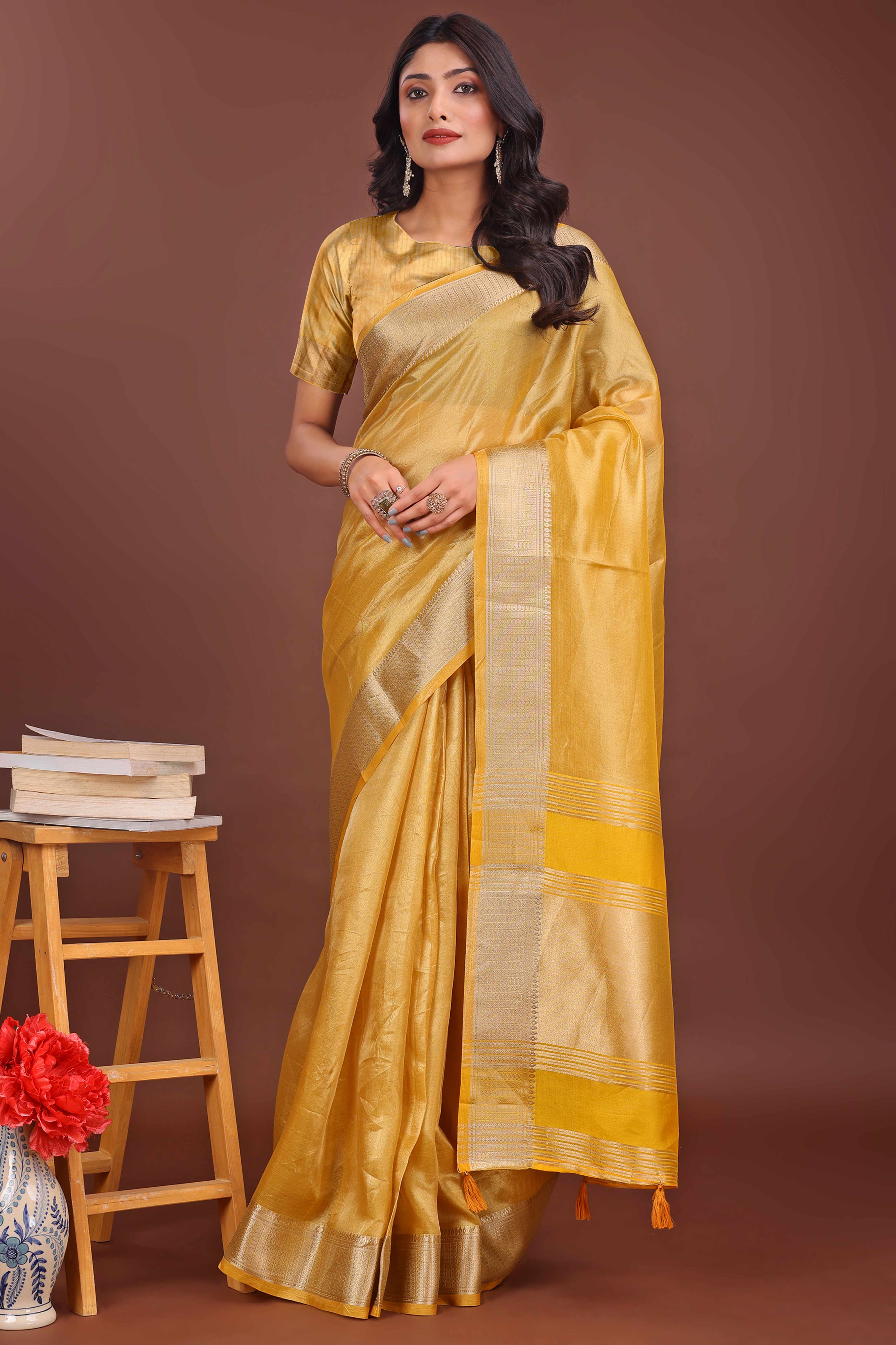 Yellow Organza Solid Saree With Lustrous Zari Weave &  Delicate Tassels