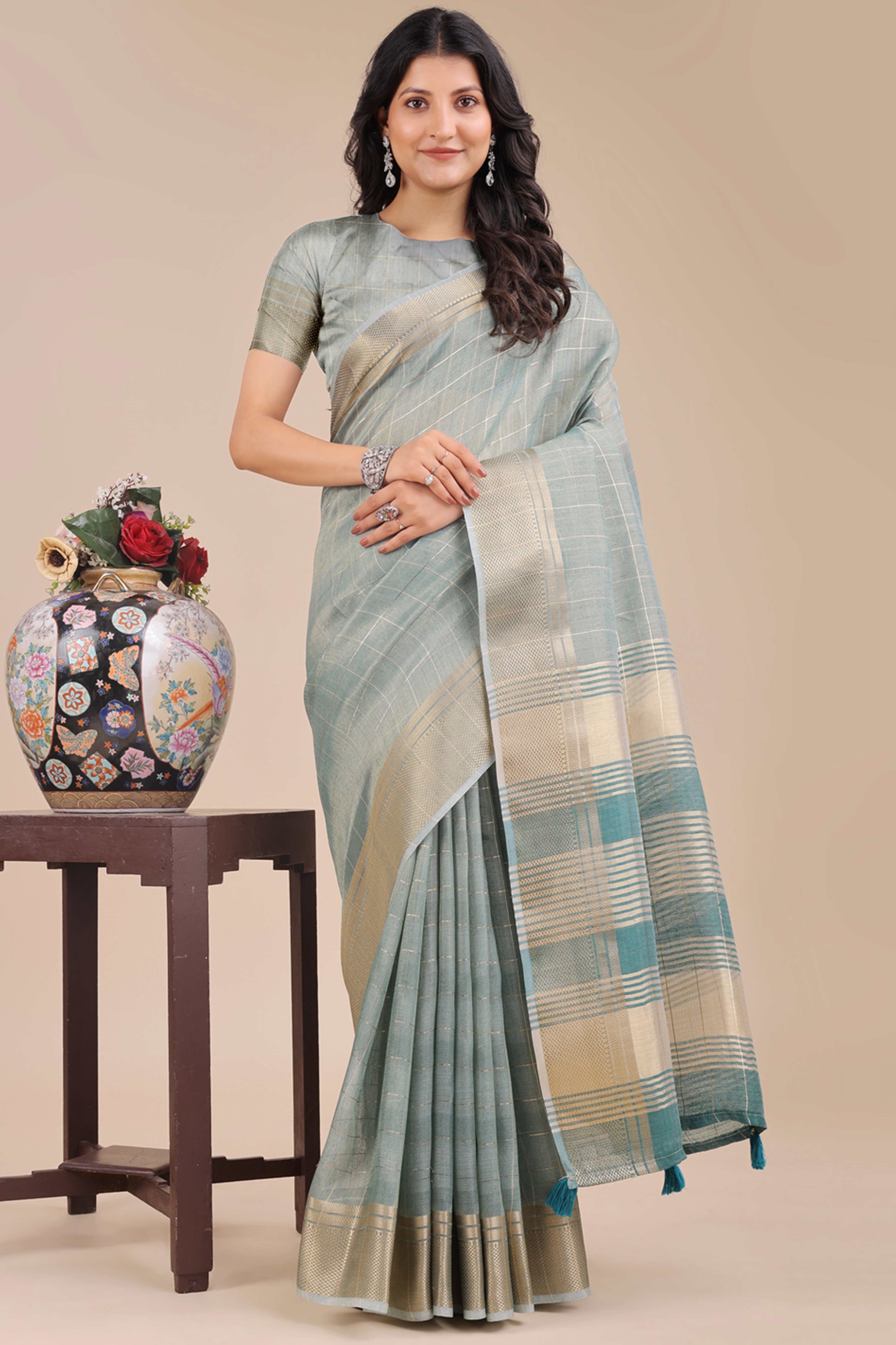 Sea Green Organza Saree with Checkered Zari Weaving Pattern and Tassels