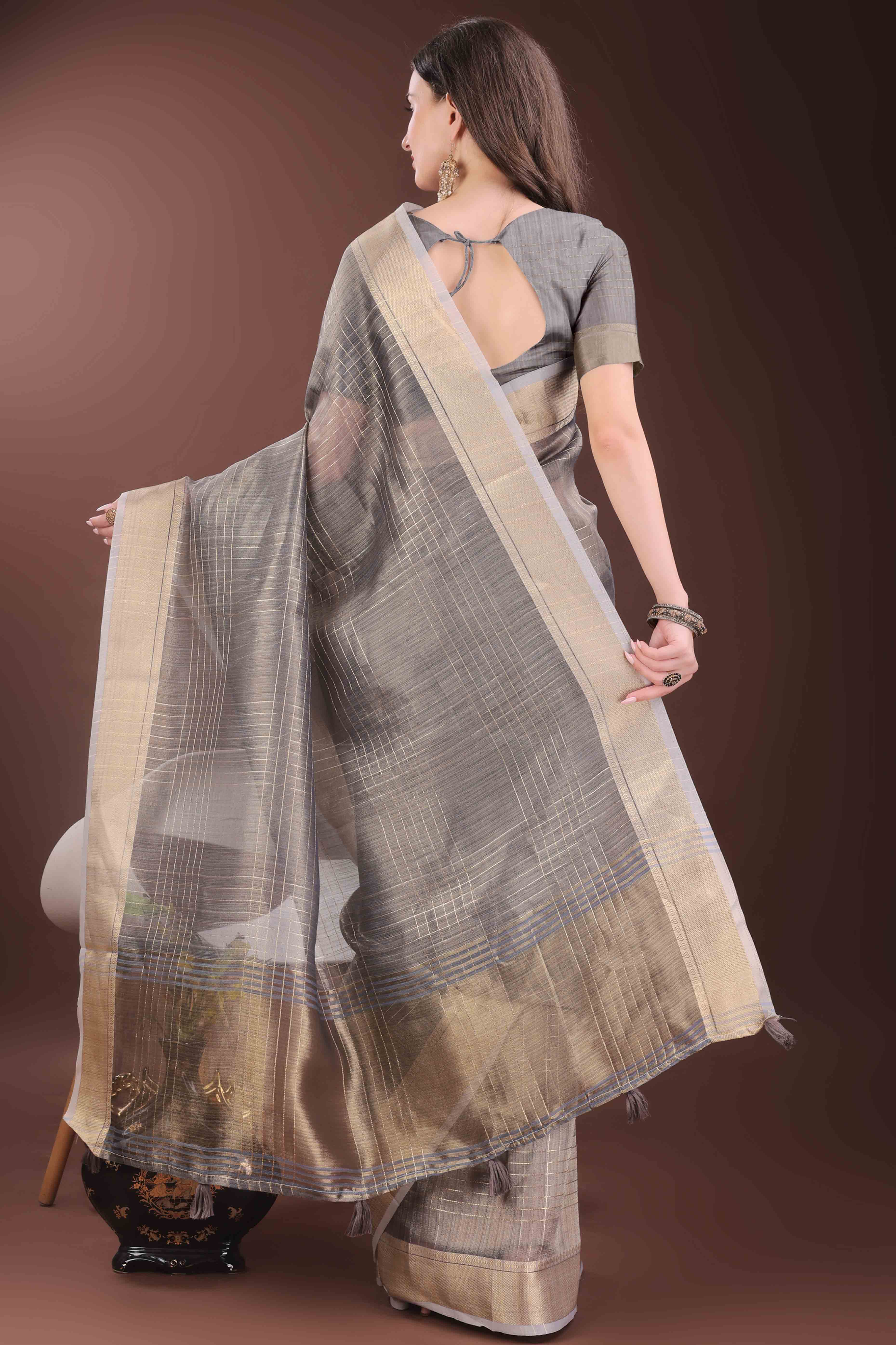 Grey Organza Saree With Zari Weaving Check Patterns & Elegant Tassel Accents