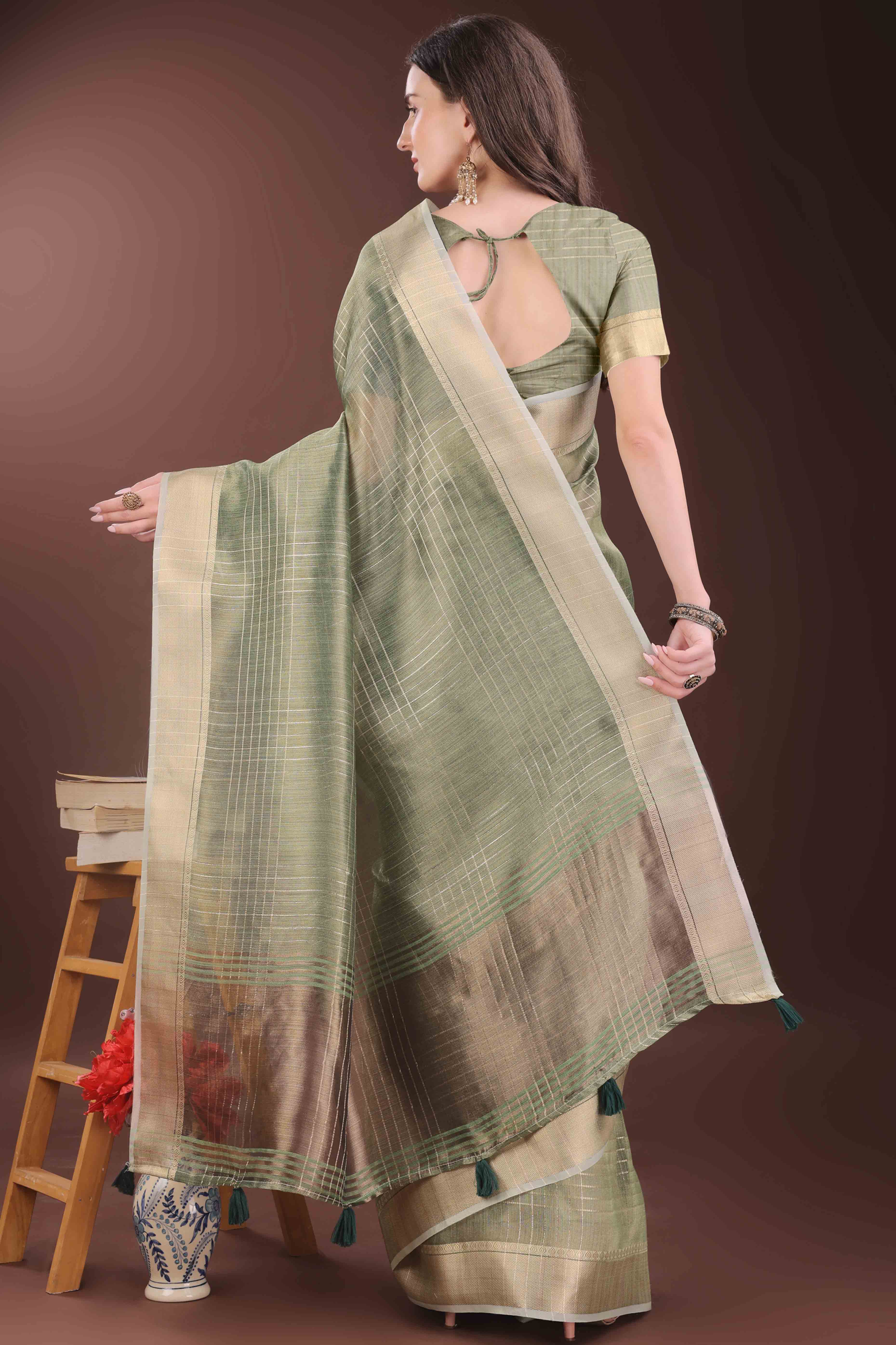 Green Organza Saree With Zari Weaving Check Patterns & Elegant Tassel Accents