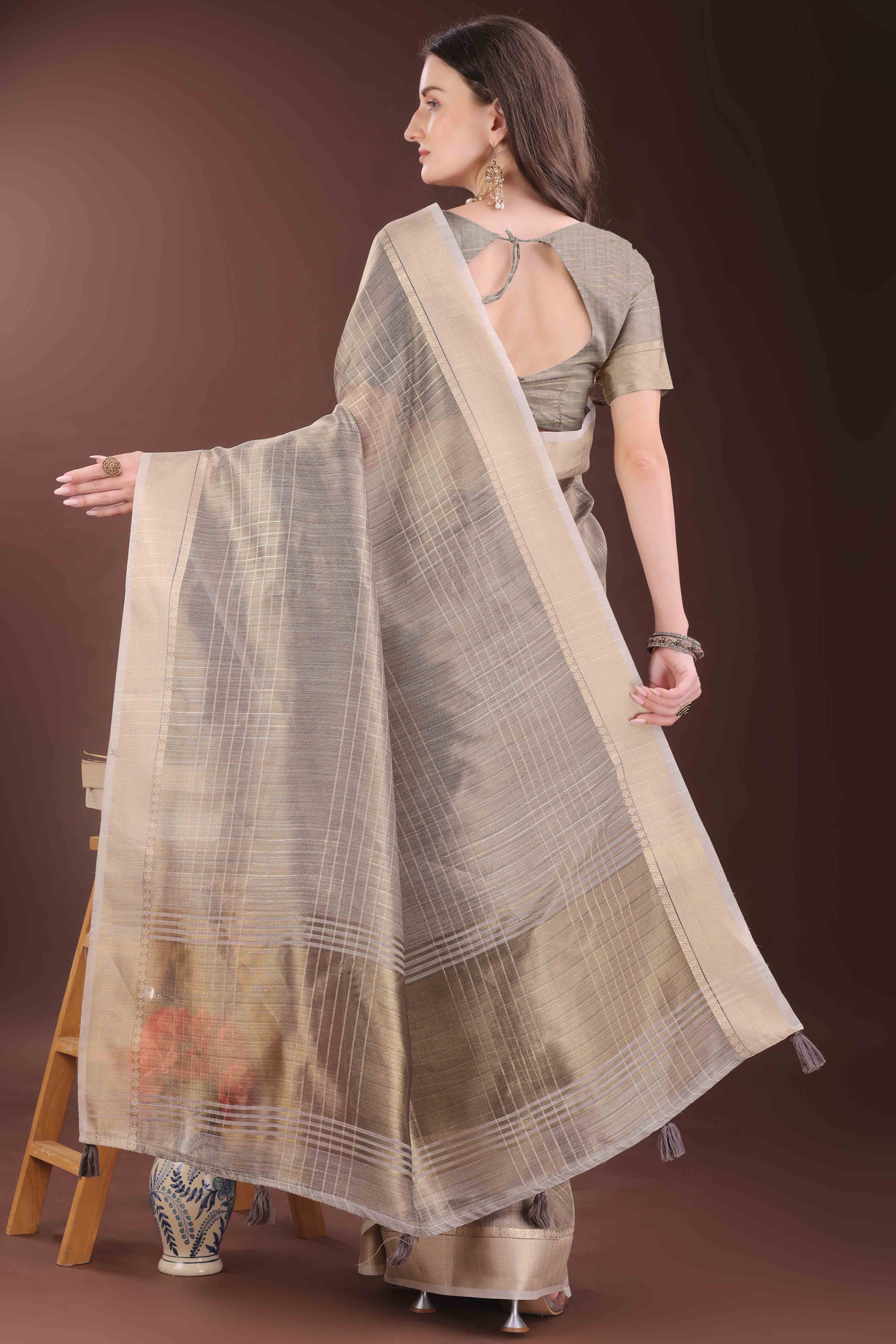 Grey Organza Saree With Zari Weaving Check Patterns & Elegant Tassel Accents