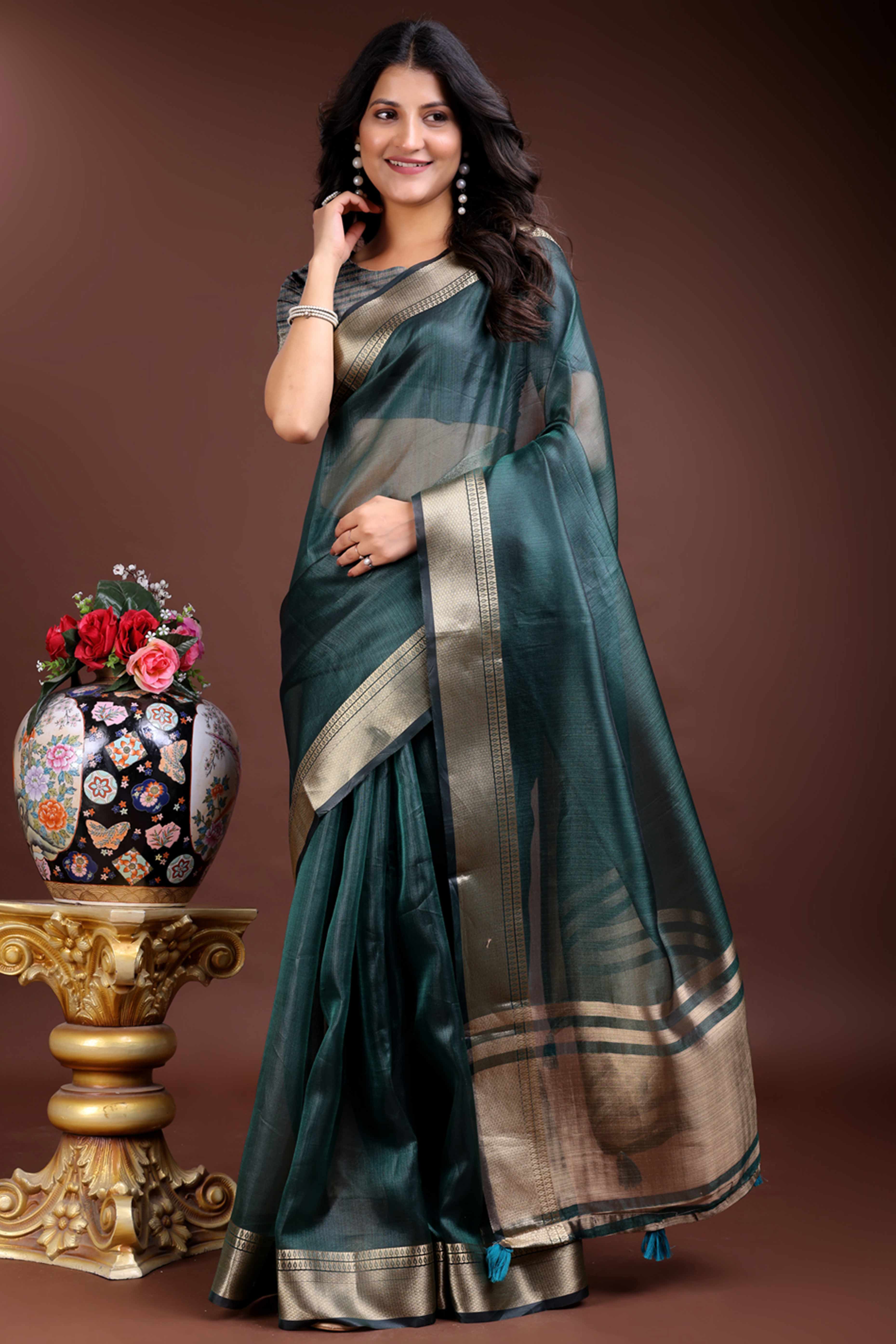 Emerald Green Organza Saree with Zari Border Weaving Charm