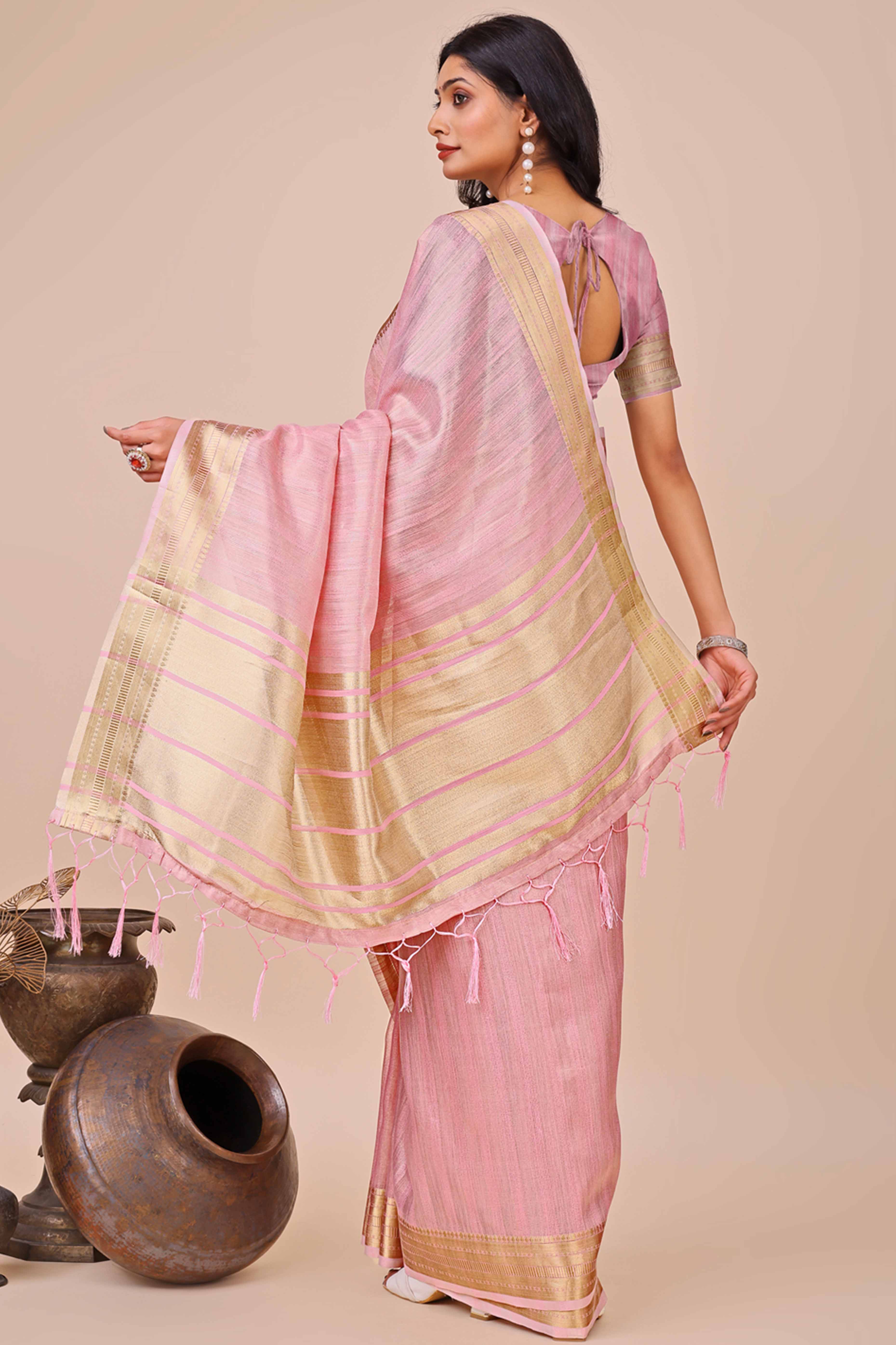 Pink Organza Saree With Intricate Weave & Elegant Tassel Accents