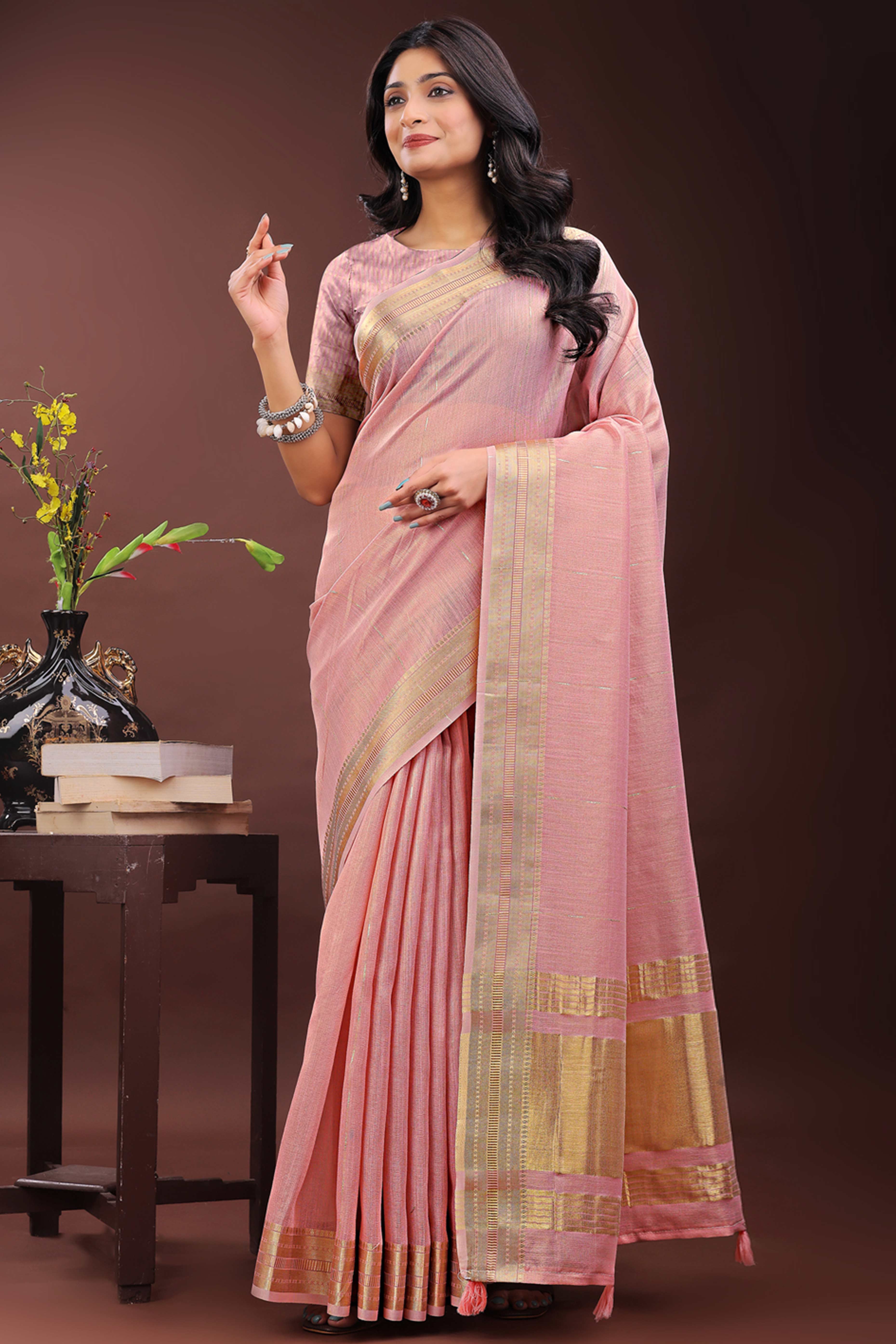 Light Pink Organza Saree Adorned With Zari Weave & Tassel Edges