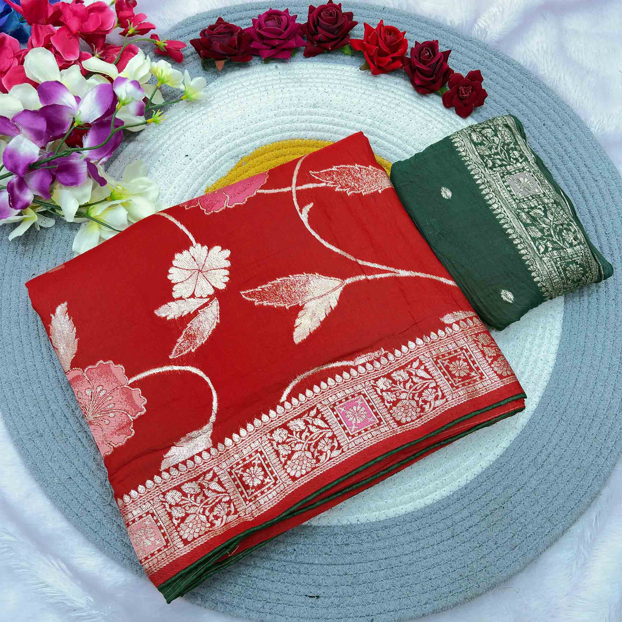 Red Graceful Soft Muslin Saree Highlighted with Premium Meenakari Zari Work