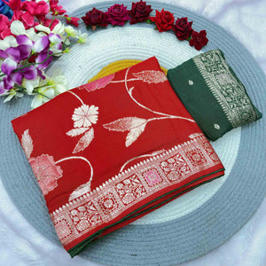 Red Graceful Soft Muslin Saree Highlighted with Premium Meenakari Zari Work