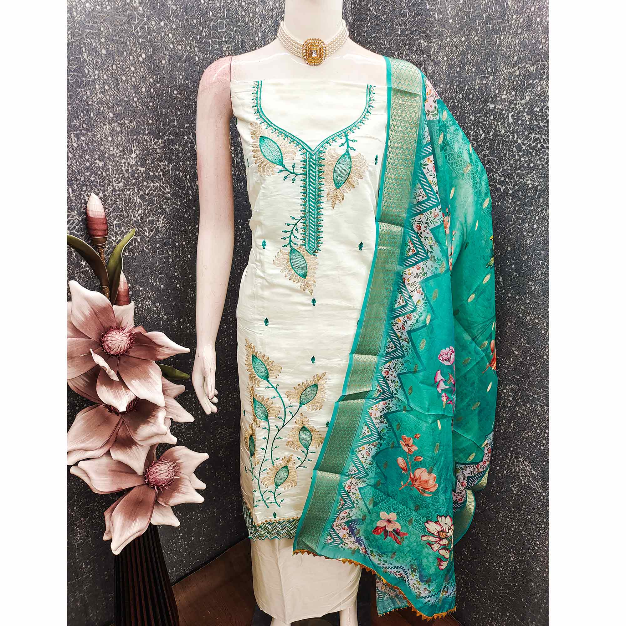 Elegant Cream & Turquoise Floral Embroidered Roman Cotton Silk Dress Material With Sequins Work