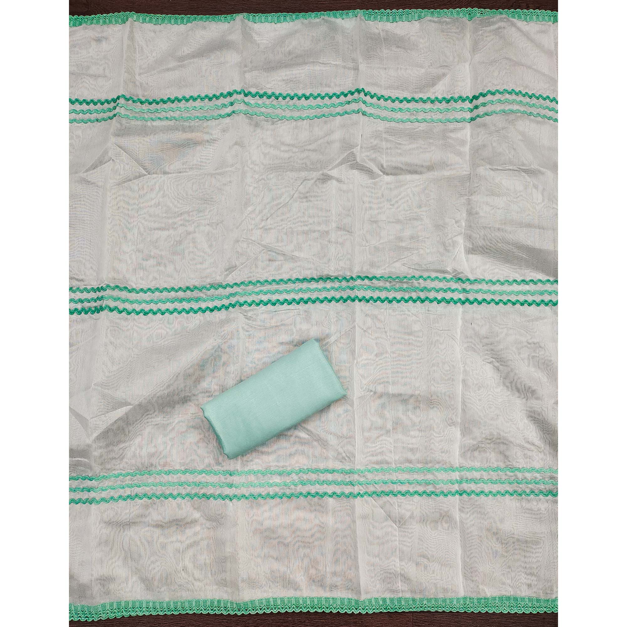 Sea Green Chanderi Silk Suit Fabric with Embroidered Highlights and Artistic Geometric Prints