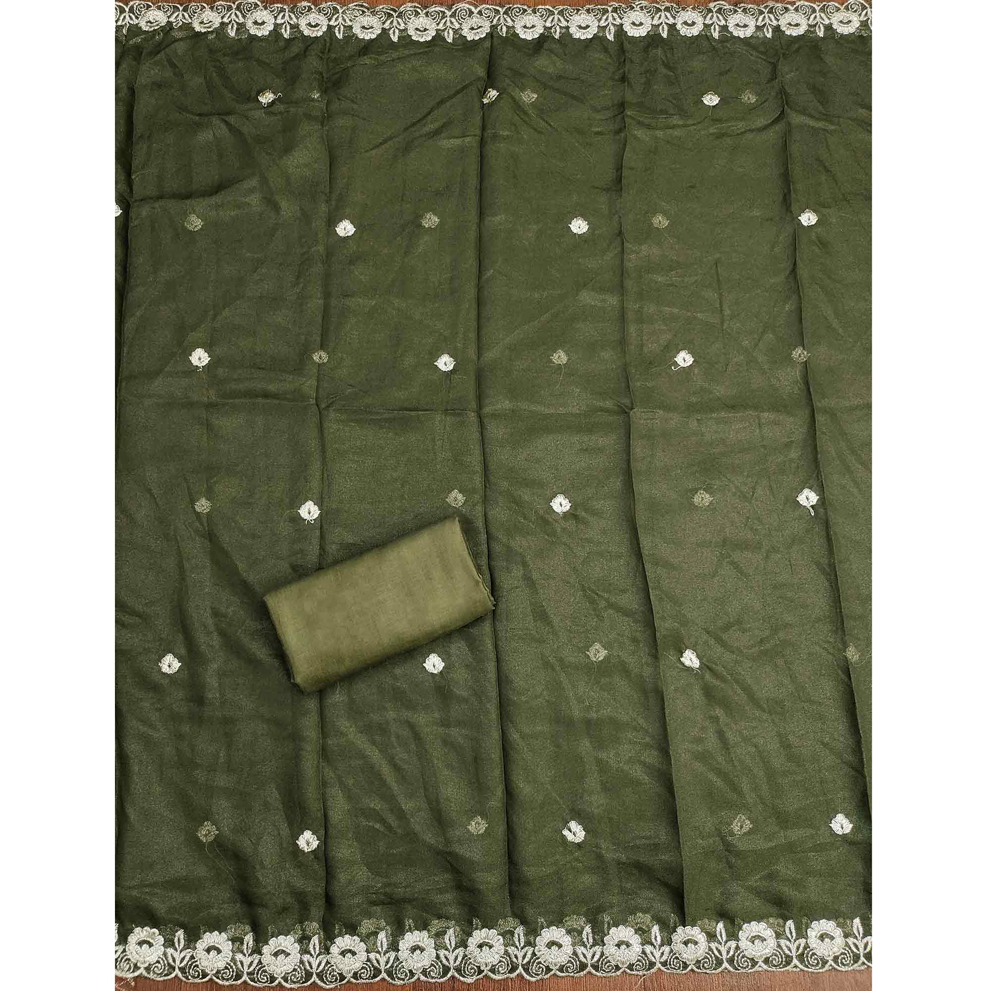 Green Georgette Dress Material Decorated with Artistic Thread Embroidery Designs