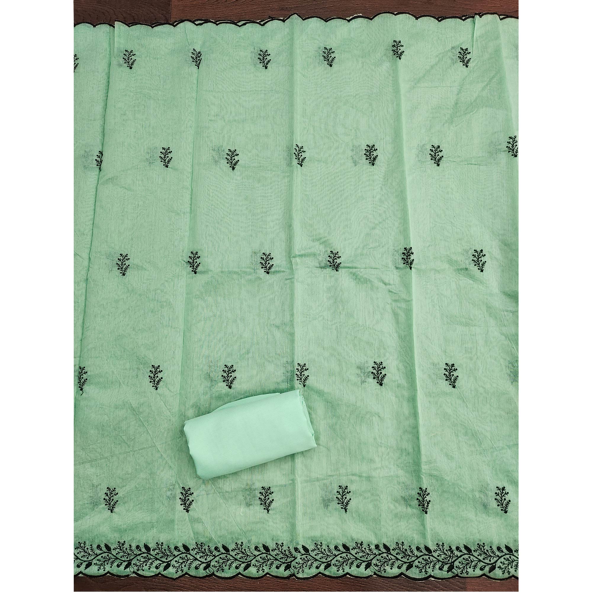 Sea Green Chanderi Cotton Dress Material Accented With Delicate Floral Thread Work