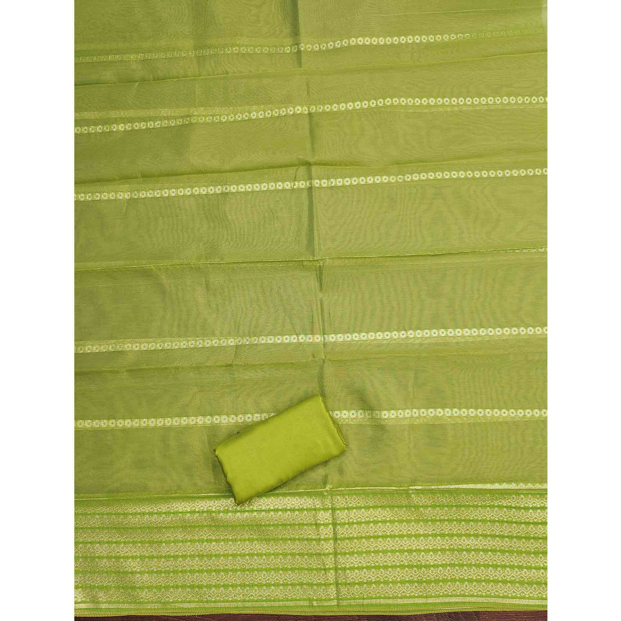 Classic Green Butti Weaving Shimmer Dress Material Enhanced With Sequins Cording Embroidery