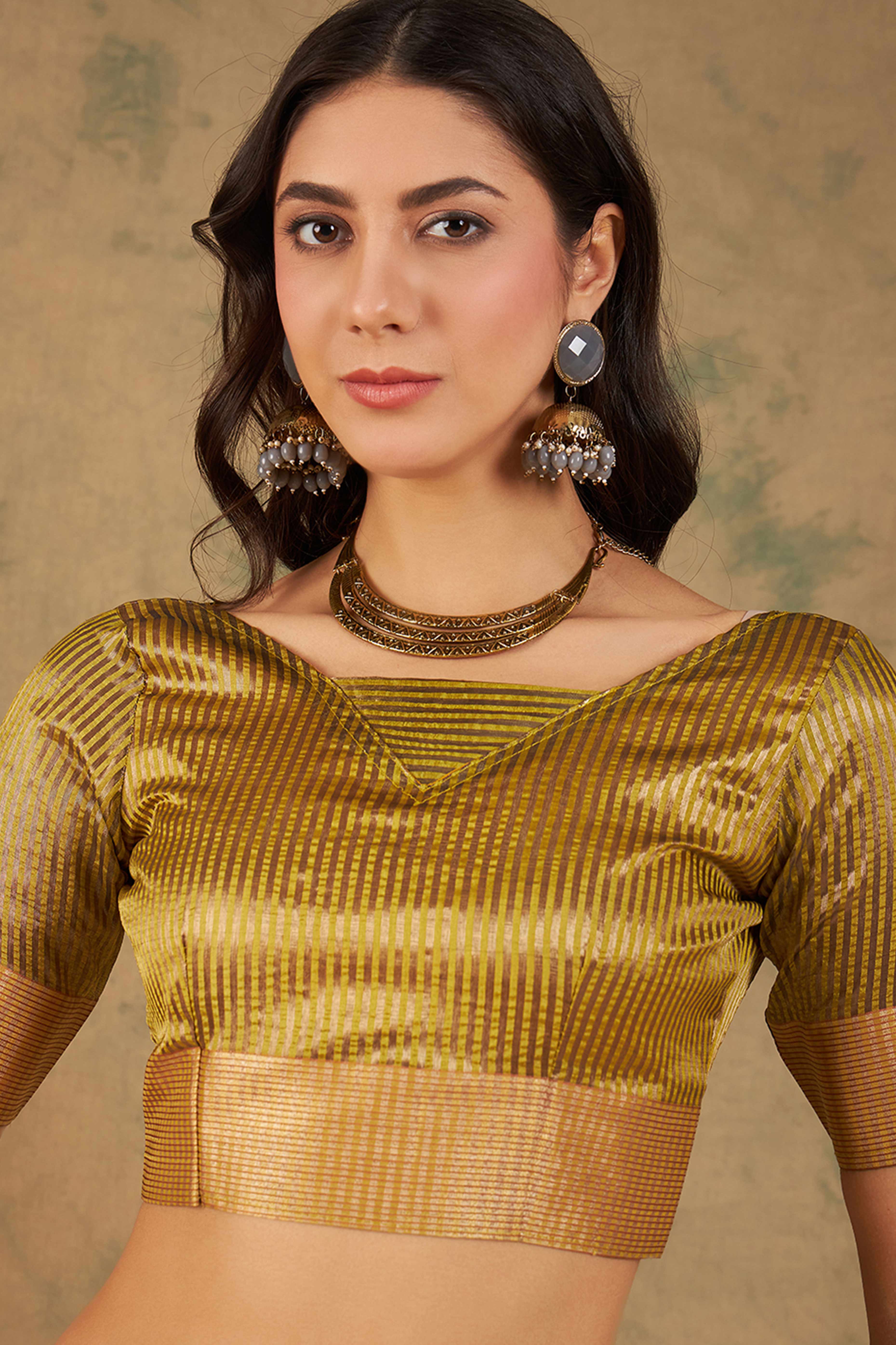 Olive Green Organza Saree In Organza With Delicate Weaving Border And Tassel Details