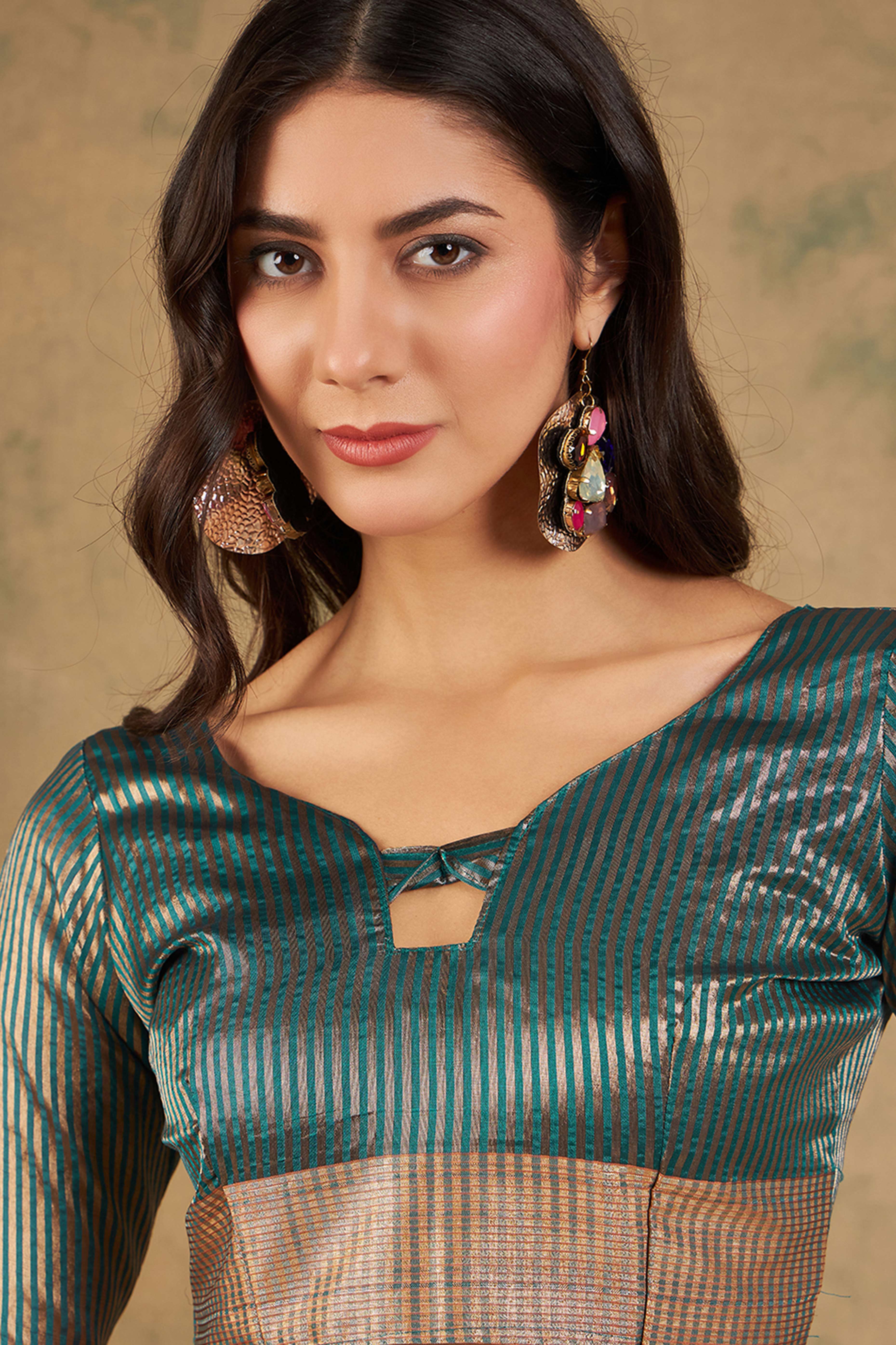 Teal Organza Saree In Organza With Delicate Weaving Border And Tassel Details