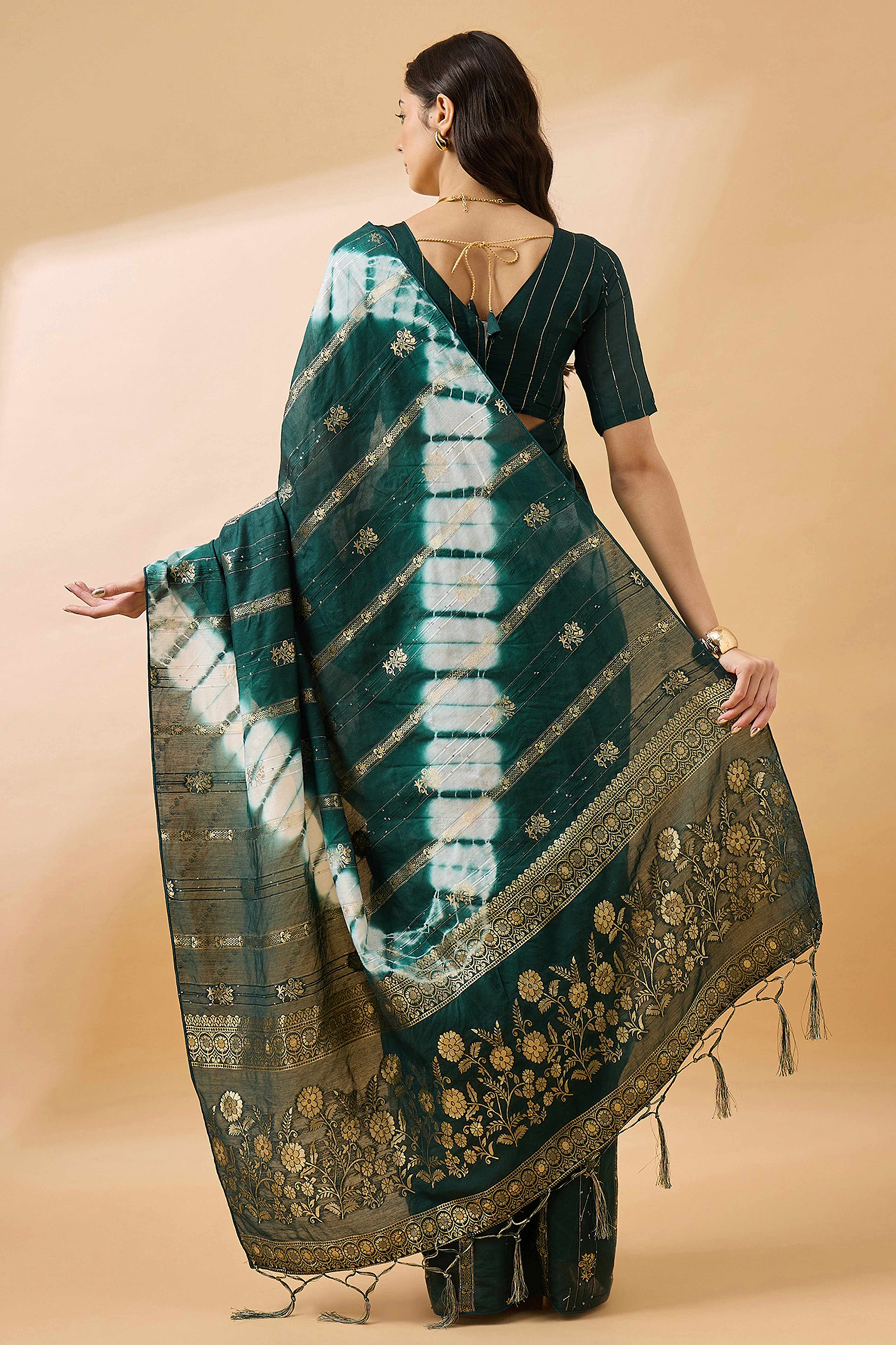 Green Floral Woven Staple Cotton Blend Saree Highlighted With Sequins Embroidery & Tasselled Pallu