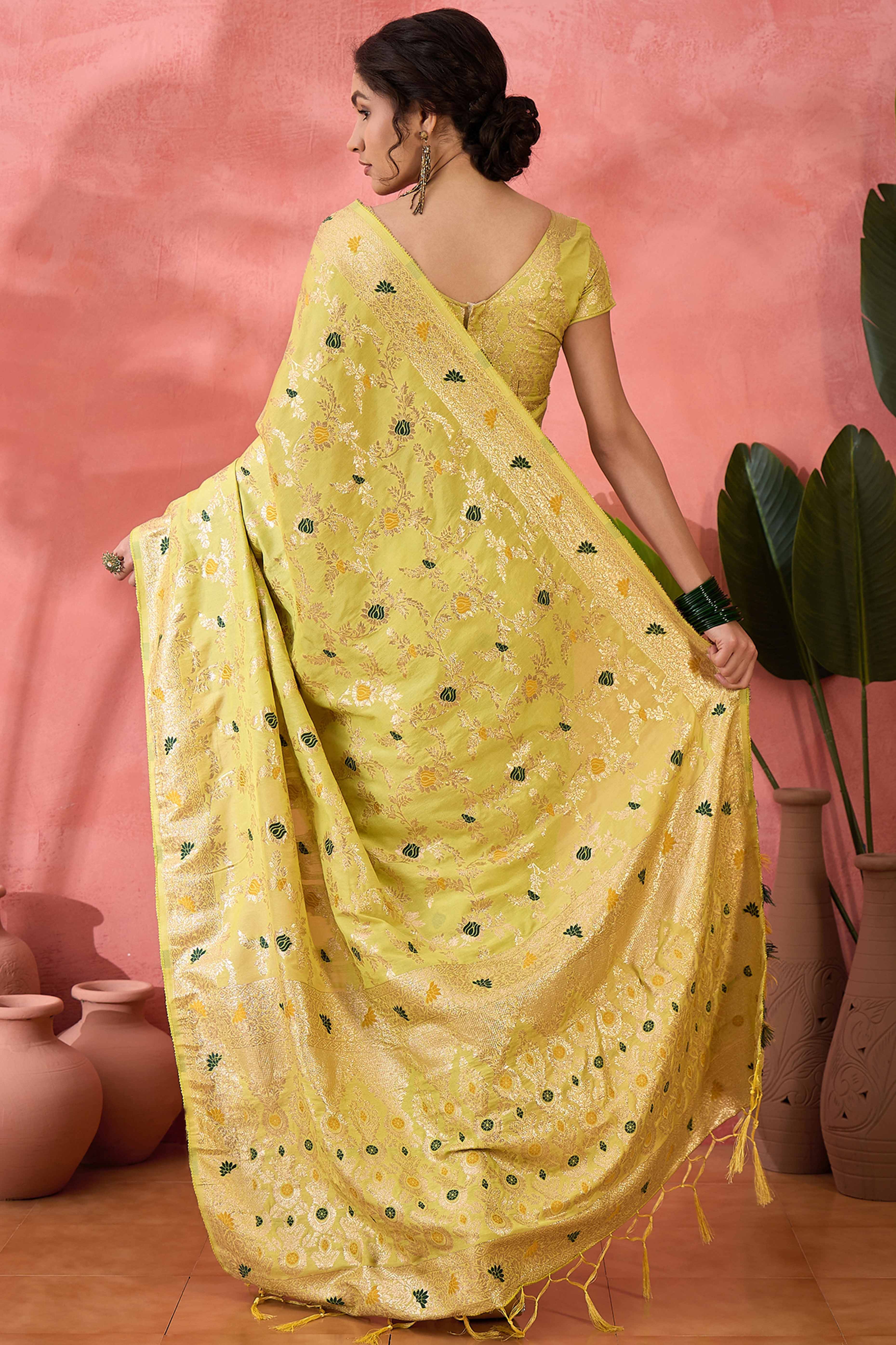 Light Yellow Cotton Blend Jacquard Saree Featuring Intricate Floral Weaving & Tassels On The Pallu