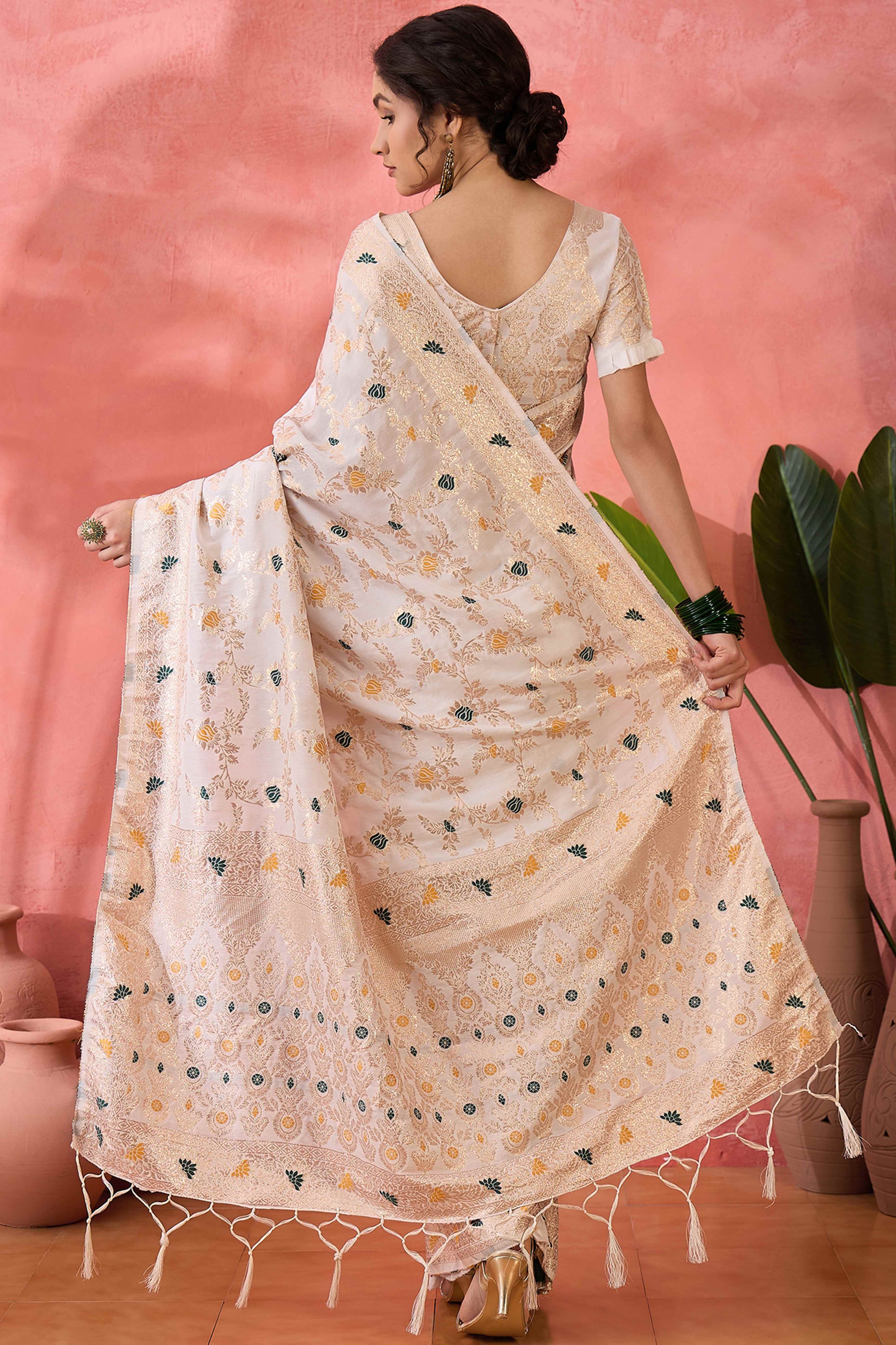Offwhite Cotton Meena Jacquard Saree Featuring Intricate Floral Weaving & Tassels On The Pallu