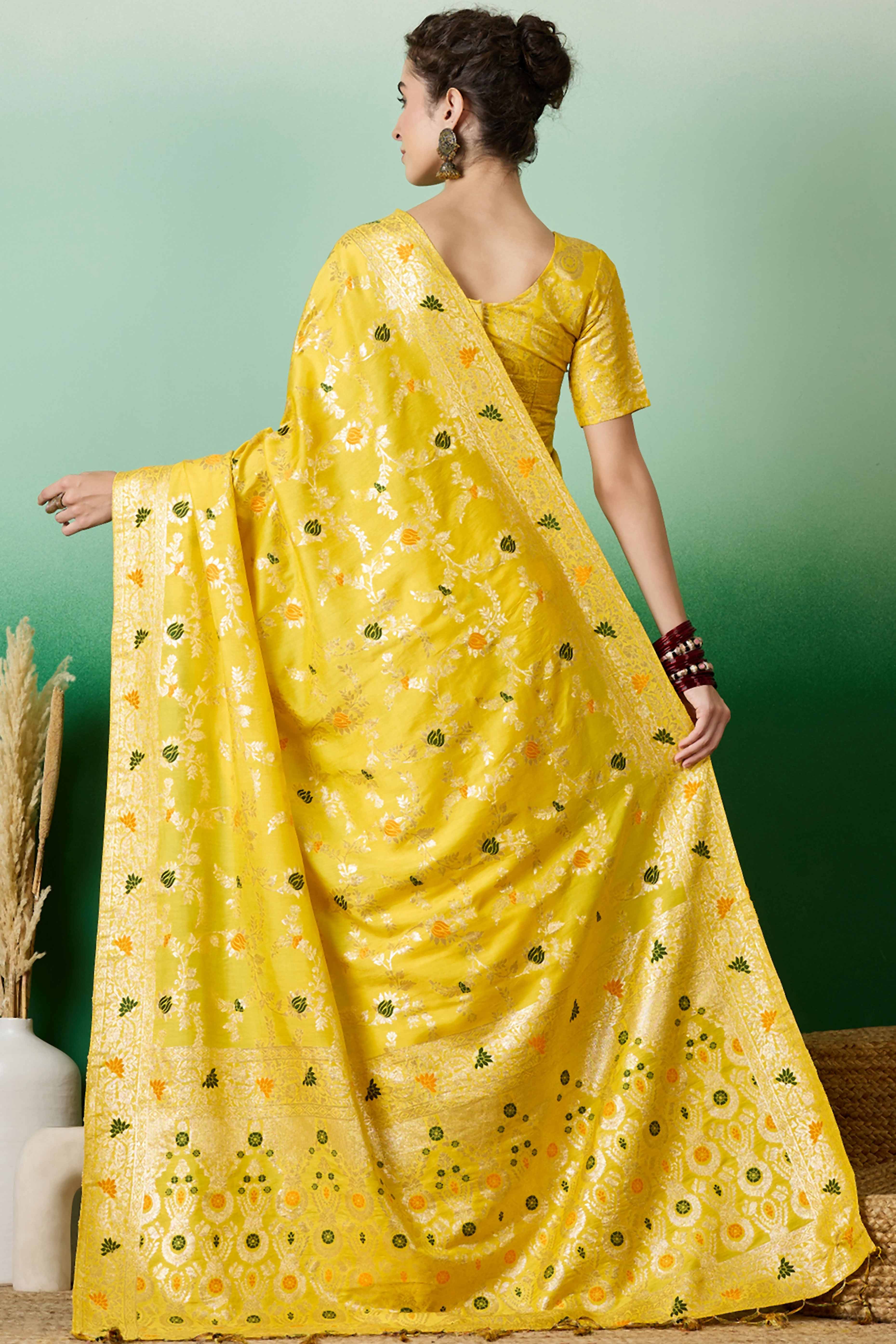Yellow Cotton Meena jacquard Saree Featuring Intricate Floral Weaving & Tassels On The Pallu