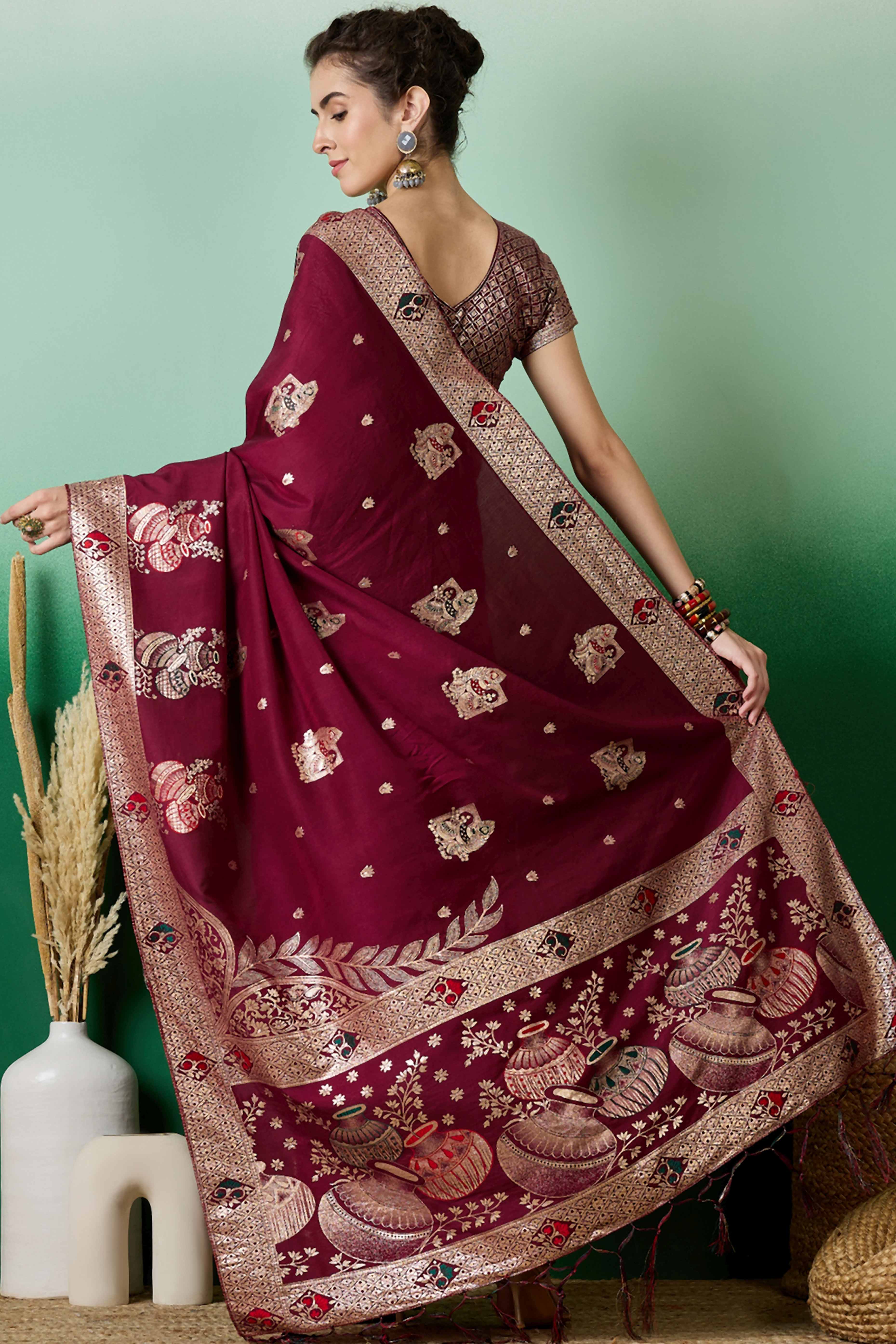 Wine Cotton Blend Saree Adorned With Floral Zari Weaving & Soft Tassel Accents